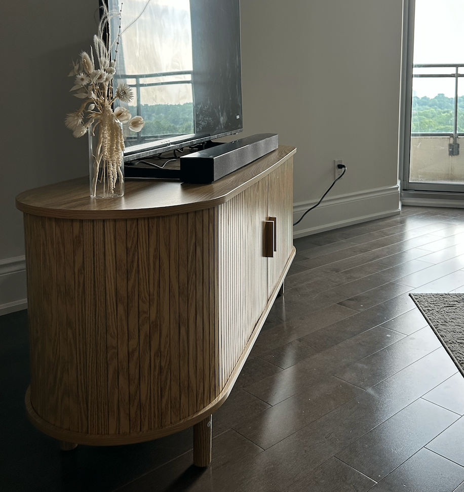 Stylish and sturdy 55-inch TV stand - moving sale