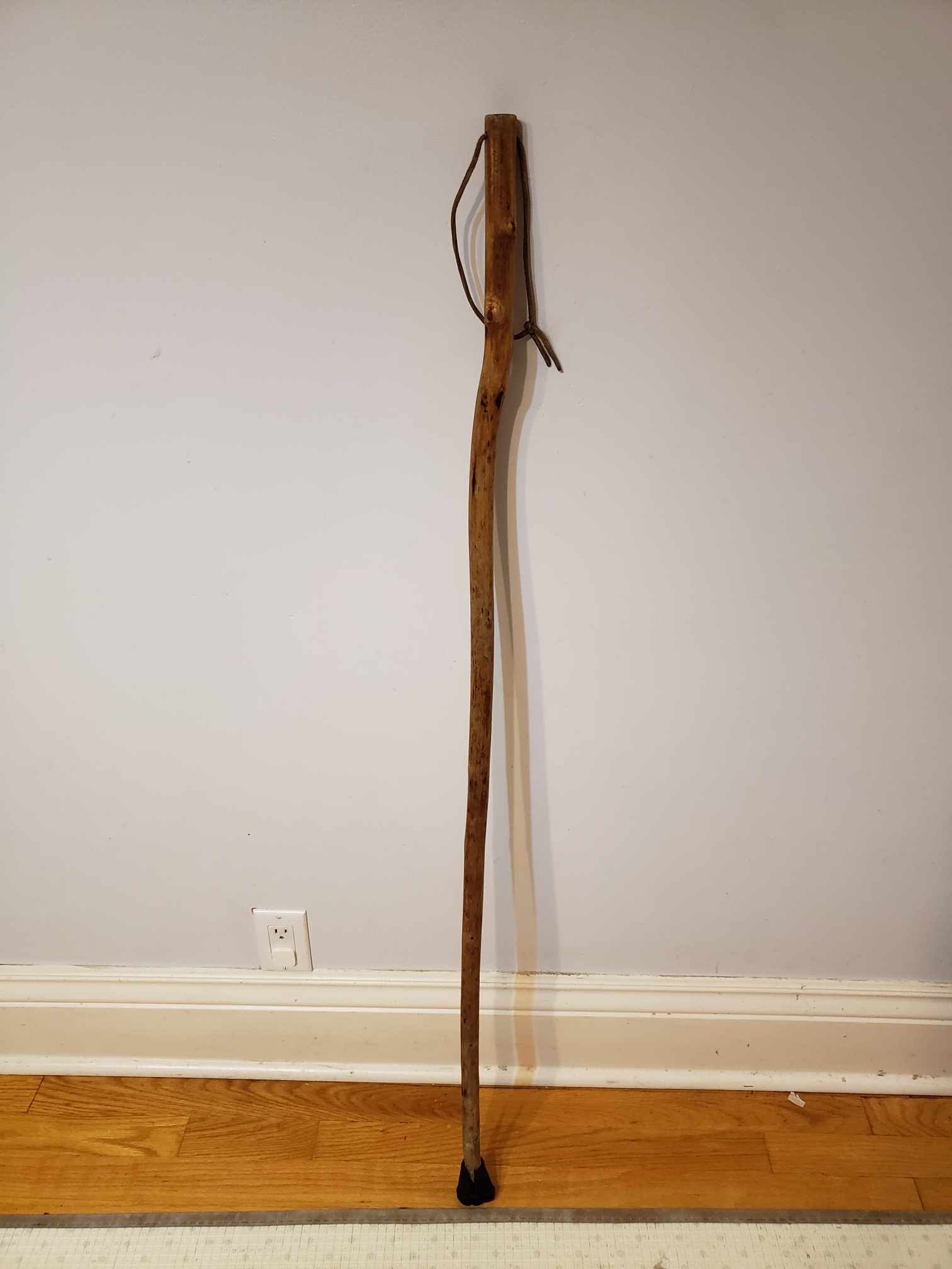 Antique hardwood walking stick with leather strap 4 feet long