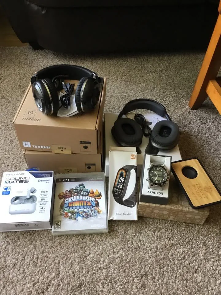 bluetooth headphones, blue tooth speaker, watch and ps3 game thumbnail