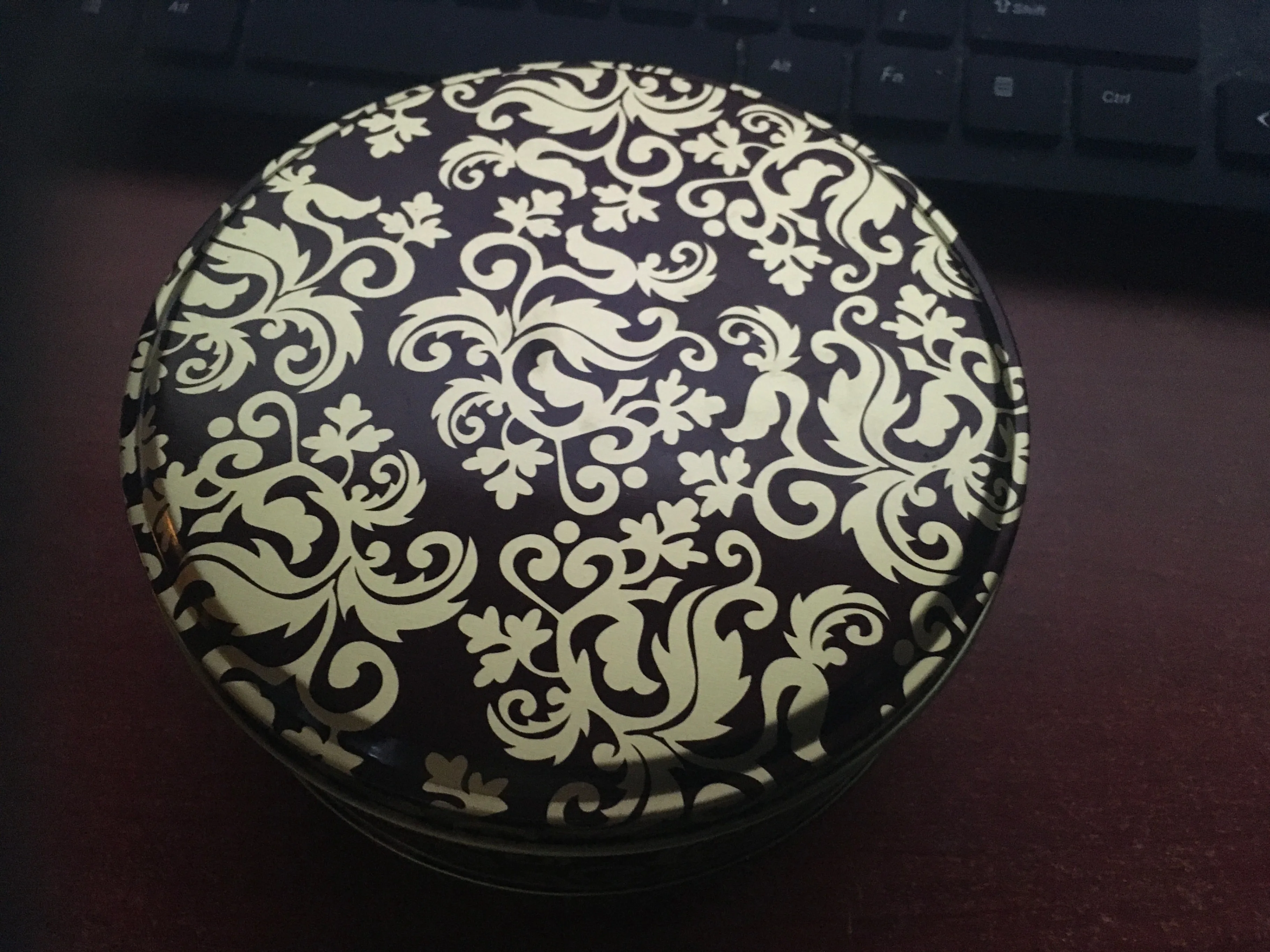Sleek Metal Collectible Tin for Stylish Storage thumbnail