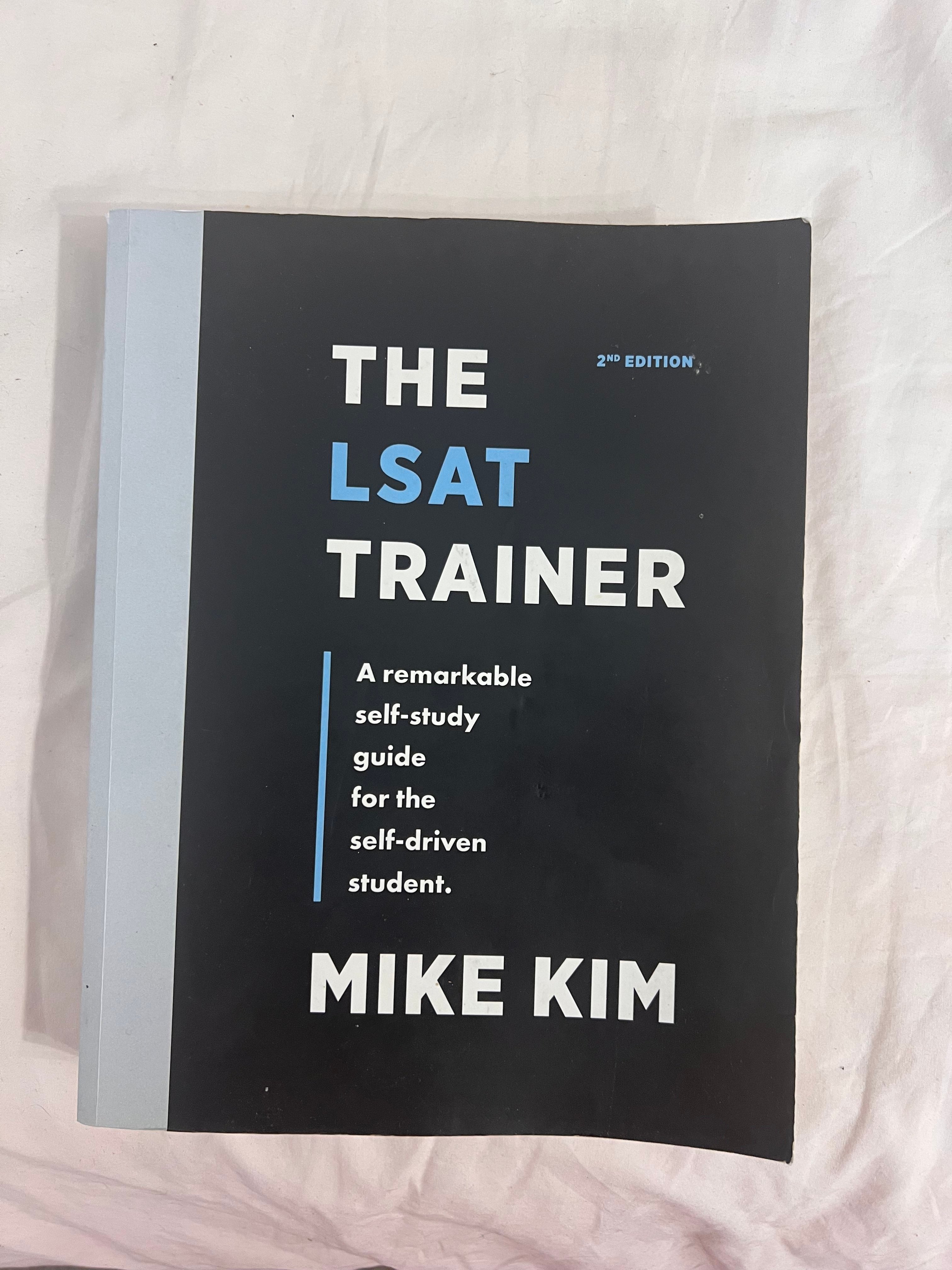 The LSAT trainer + 6 Prep test booklets