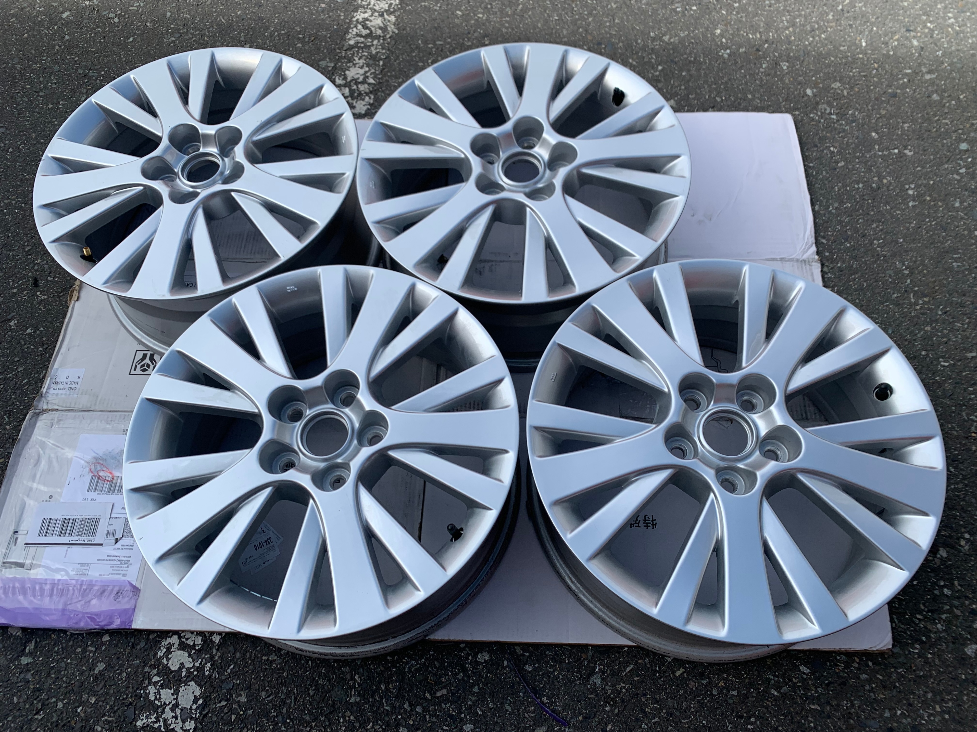 SET Of Brand New OEM factory 17X7" et55 Mazda rims as new in box