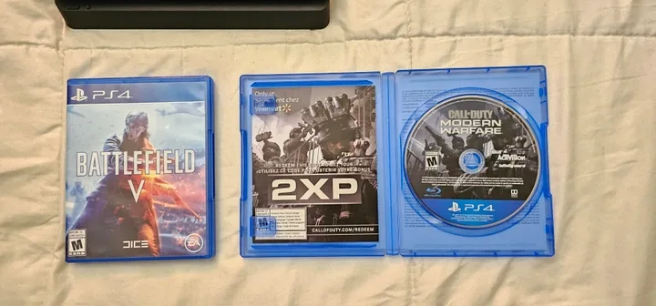 (Like New) PS4 Slim 1TB Console + Controller + MW19 + BFV image indicator(4)