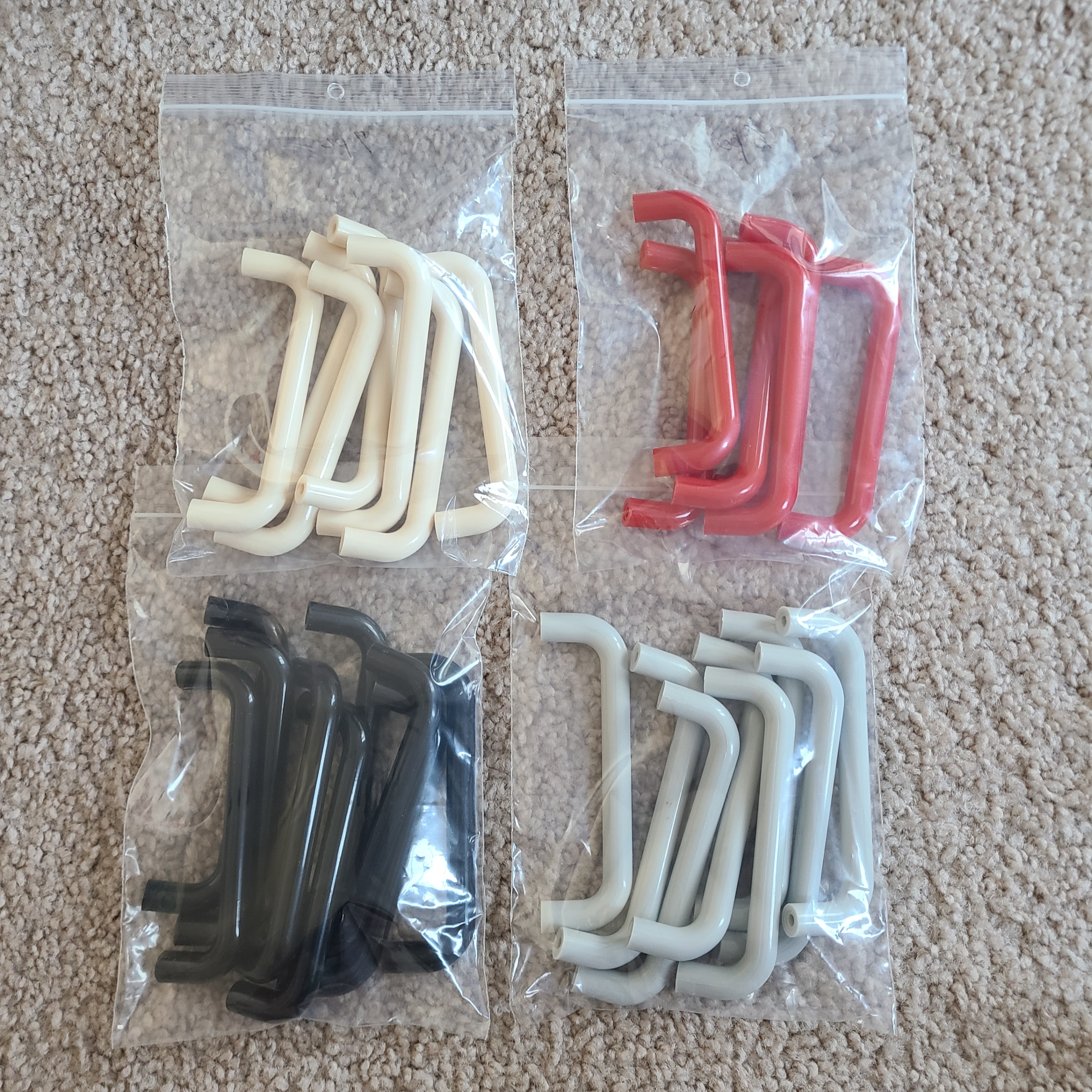 30 New Plastic Cabinet/Drawer Pulls - 4 colours