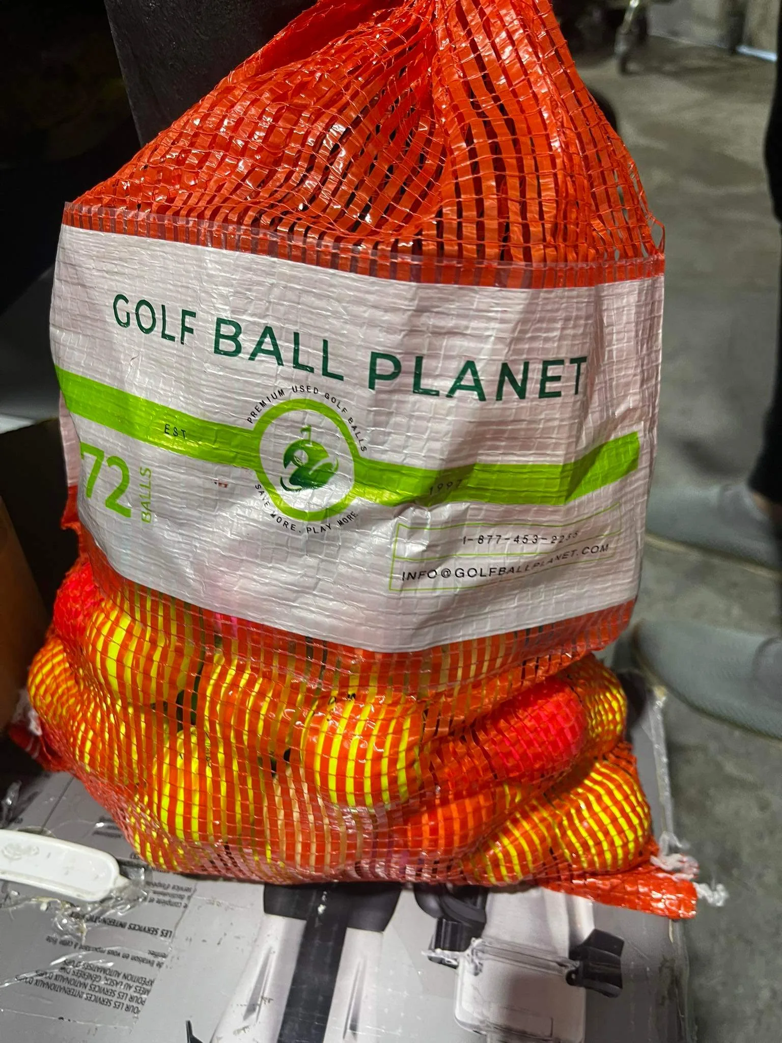 Golf Ball Planet 72 Colored Used Golf Balls in Mesh Bag 3A/2A Co thumbnail