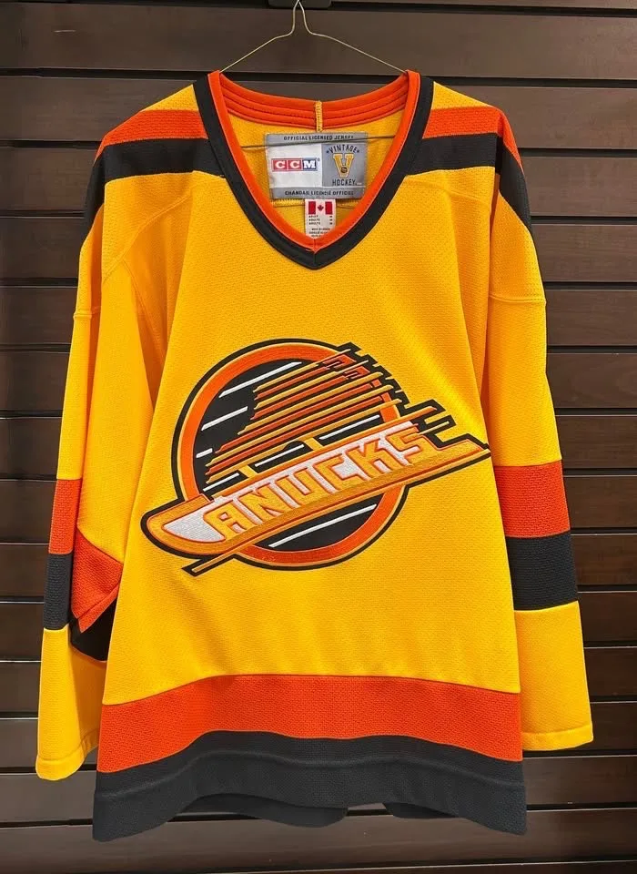 CCM Vancouver Canucks Rare 80s Yellow Skate Jersey thumbnail