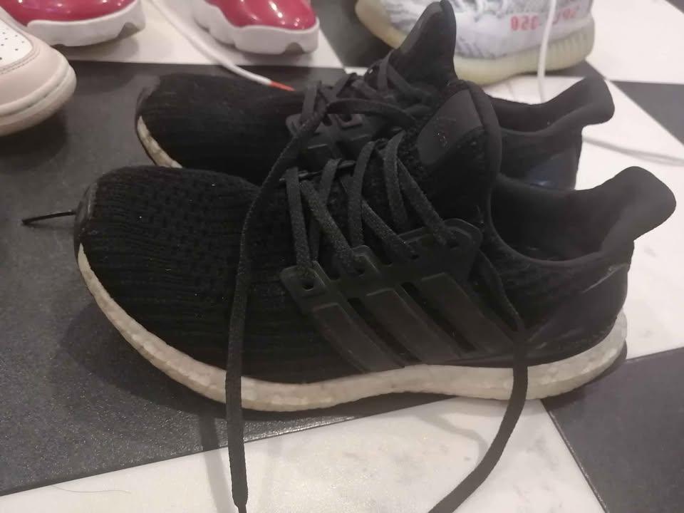 black Adidas ultraboost sneakers