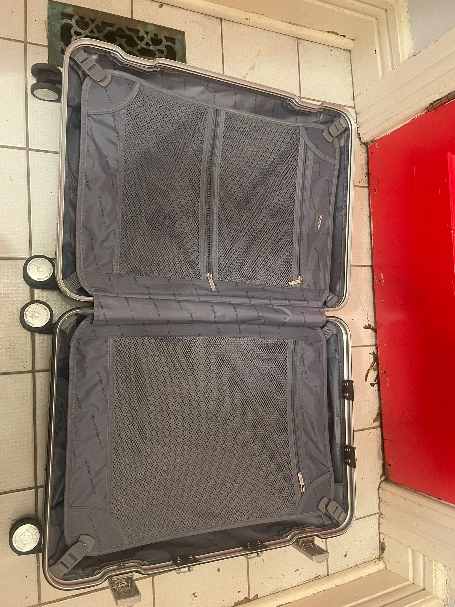 Swiss Military Medium-Large Checked Luggage – $30 image indicator(5)