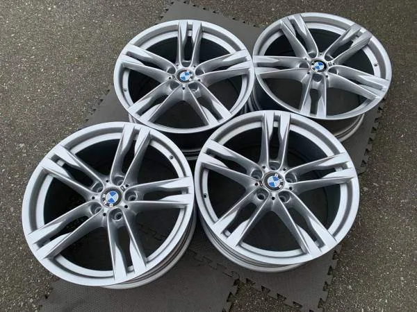 Set of Genuine factory F12 6 series 20" style 373 rims as New thumbnail