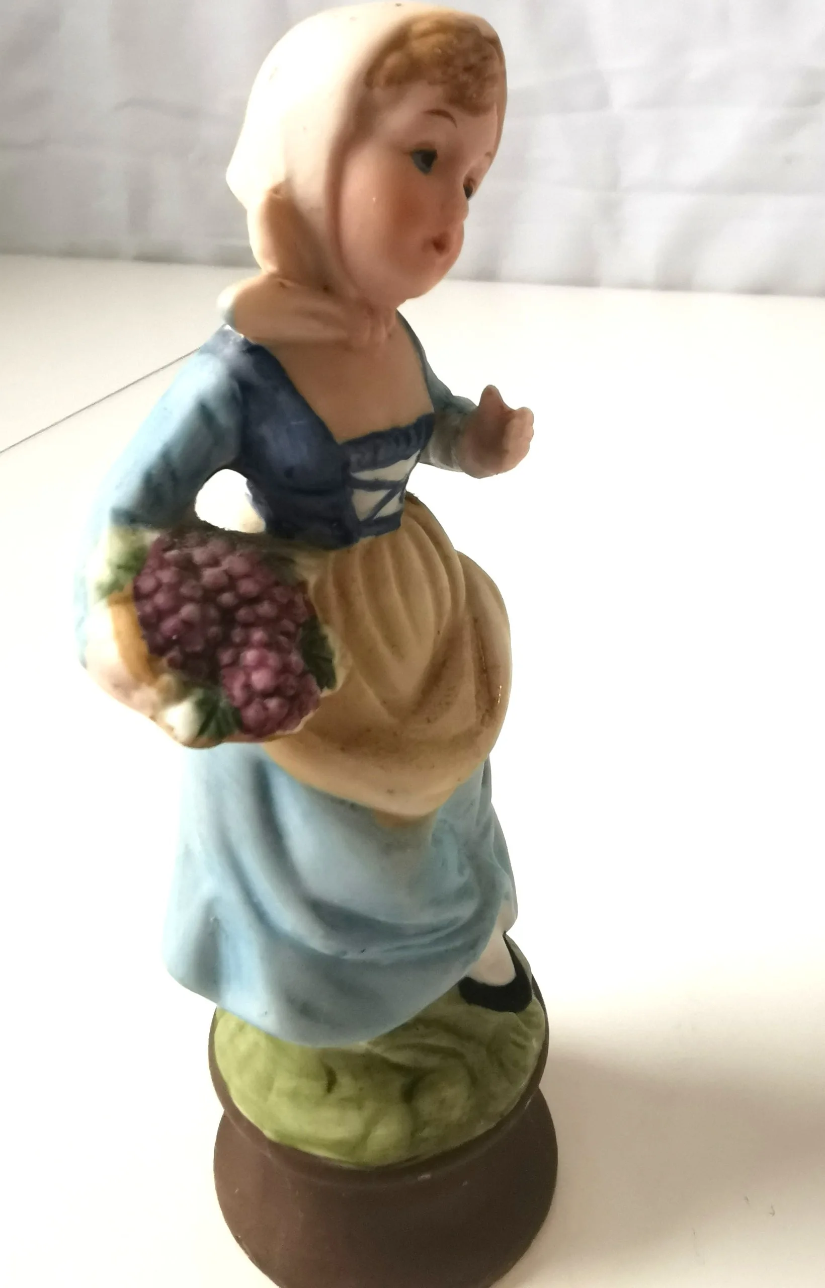 Vintage porcelain Ardalt Girl carrying Basket of Grapes 8" image indicator(7)