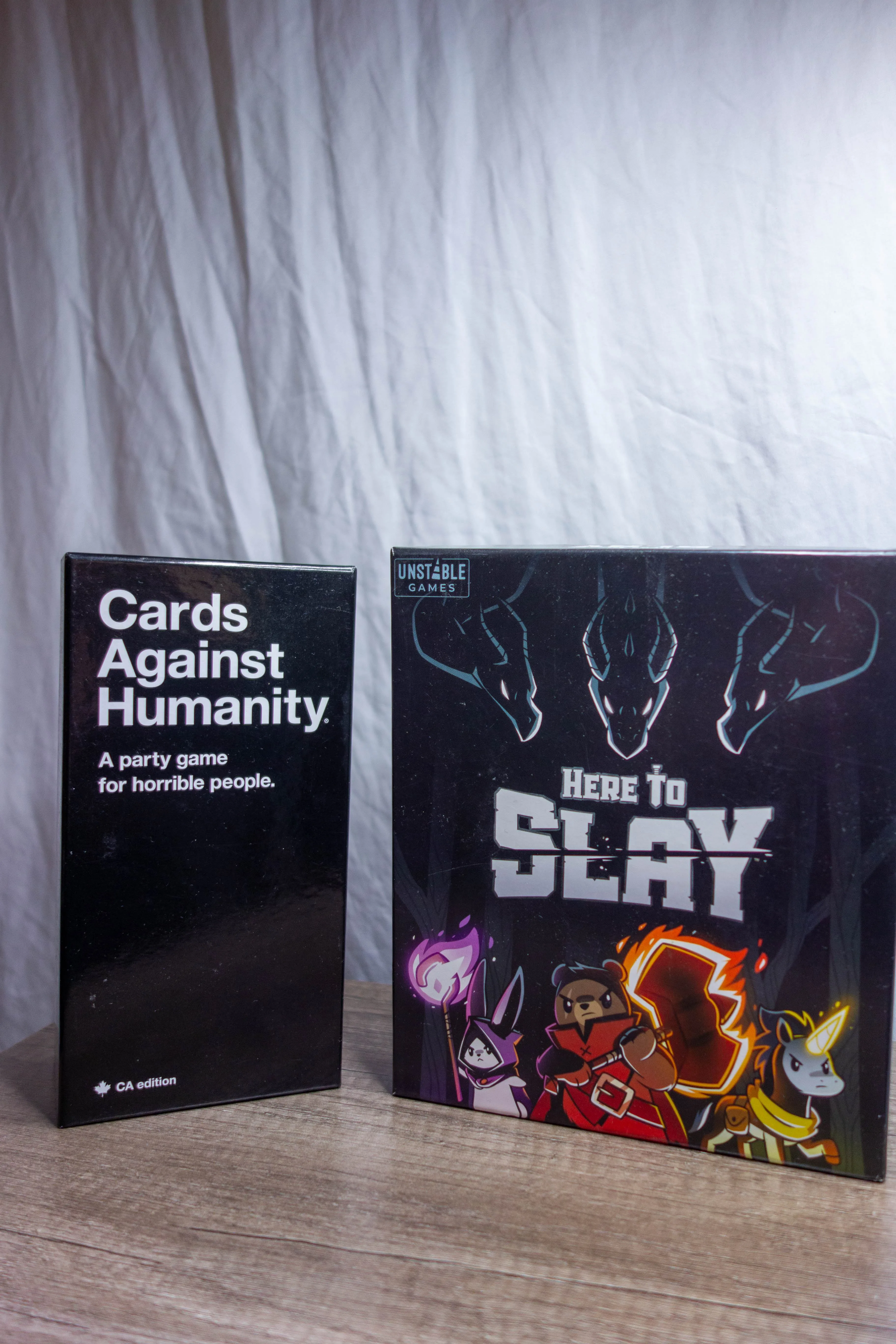 Cards Against Humanity (CA Edition) + Here to Slay