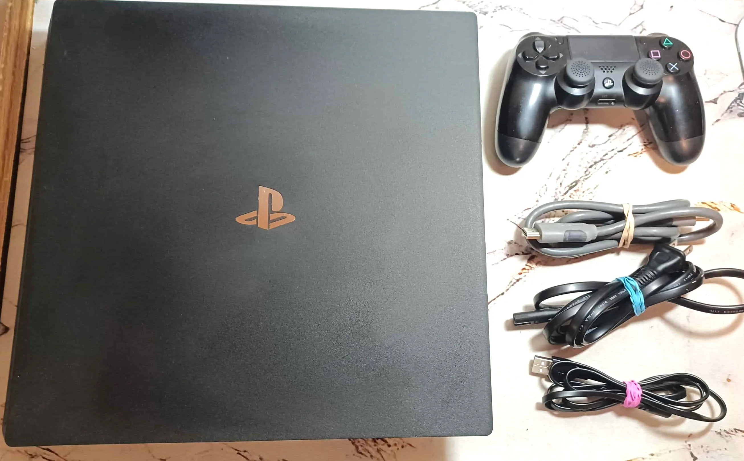 PS4 Pro 1TB + Controller + All Cords thumbnail