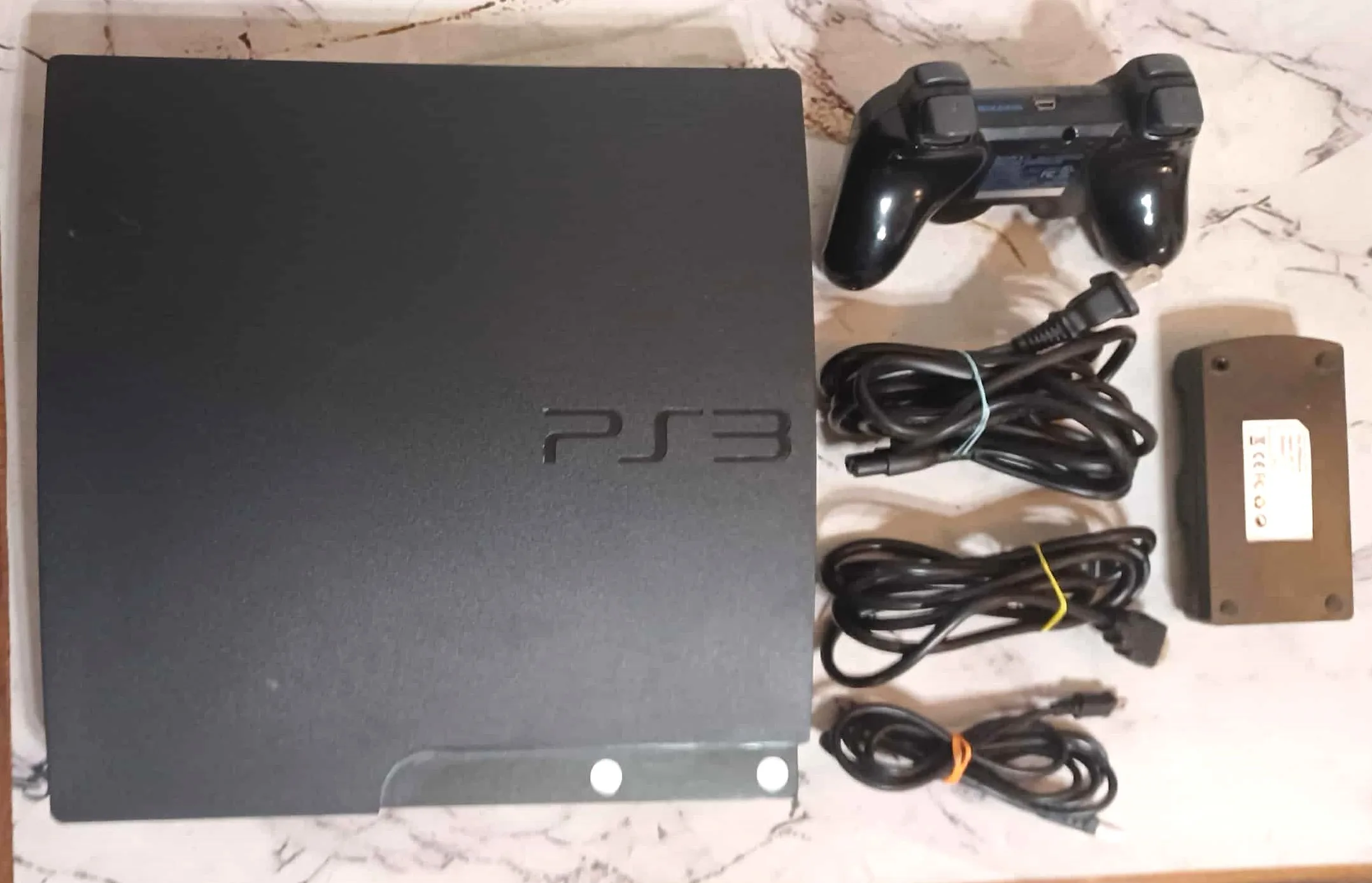 PS3 120 GB + Controller + Controller Charging Stand + All Cords image indicator(2)