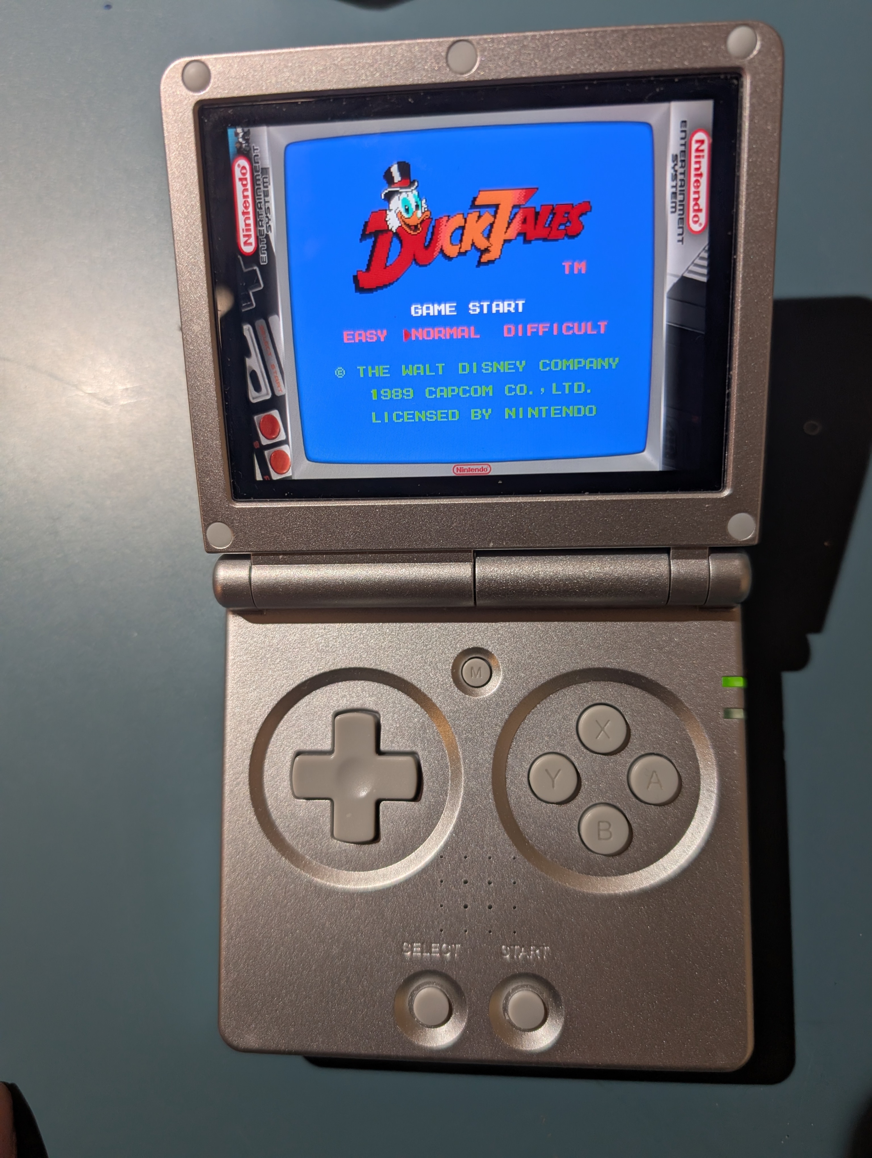 Used ANBERNIC RG35XXSP Silver Handheld Game Console with Bonus - photo 3
