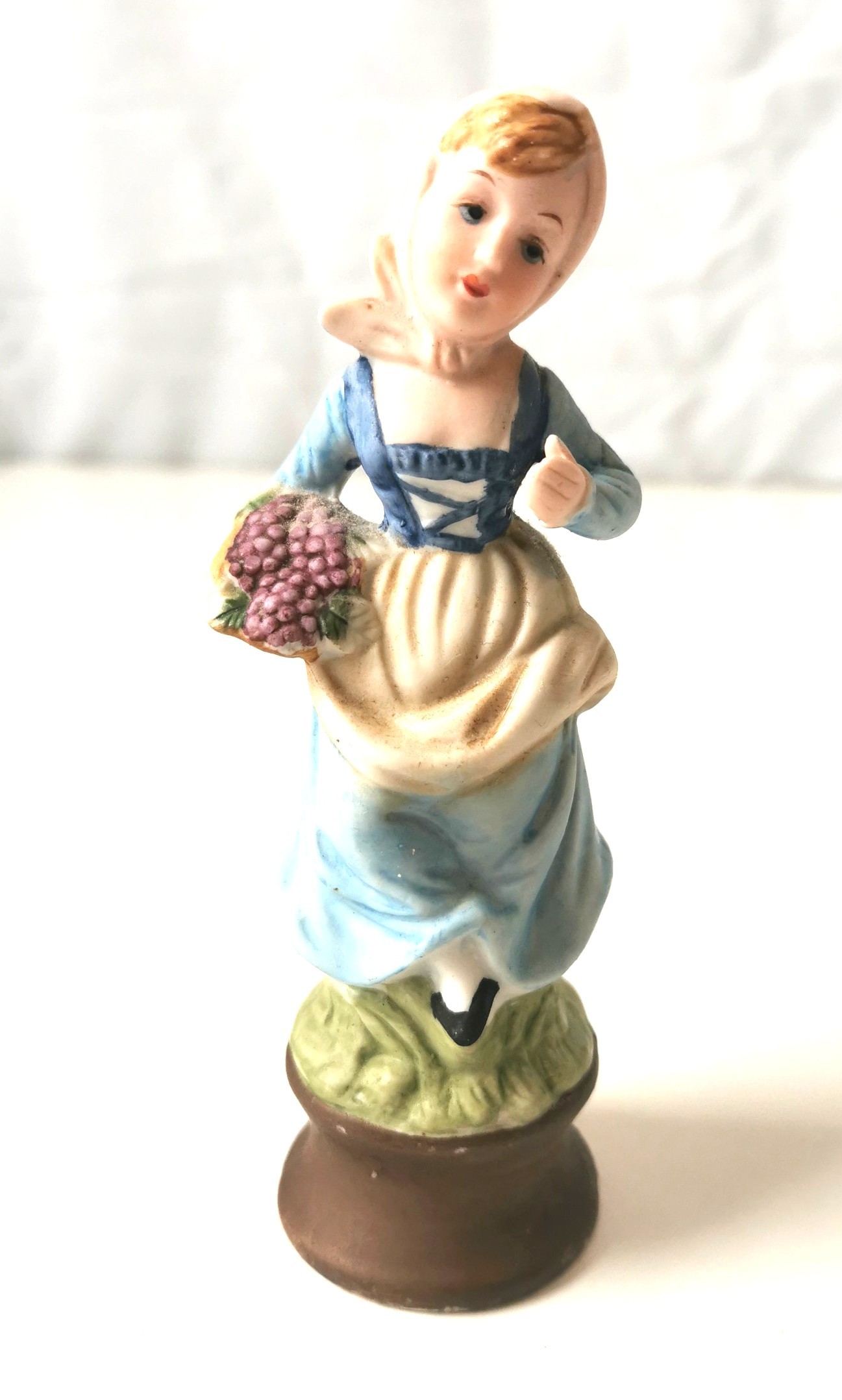 Vintage porcelain Ardalt Girl carrying Basket of Grapes 8"