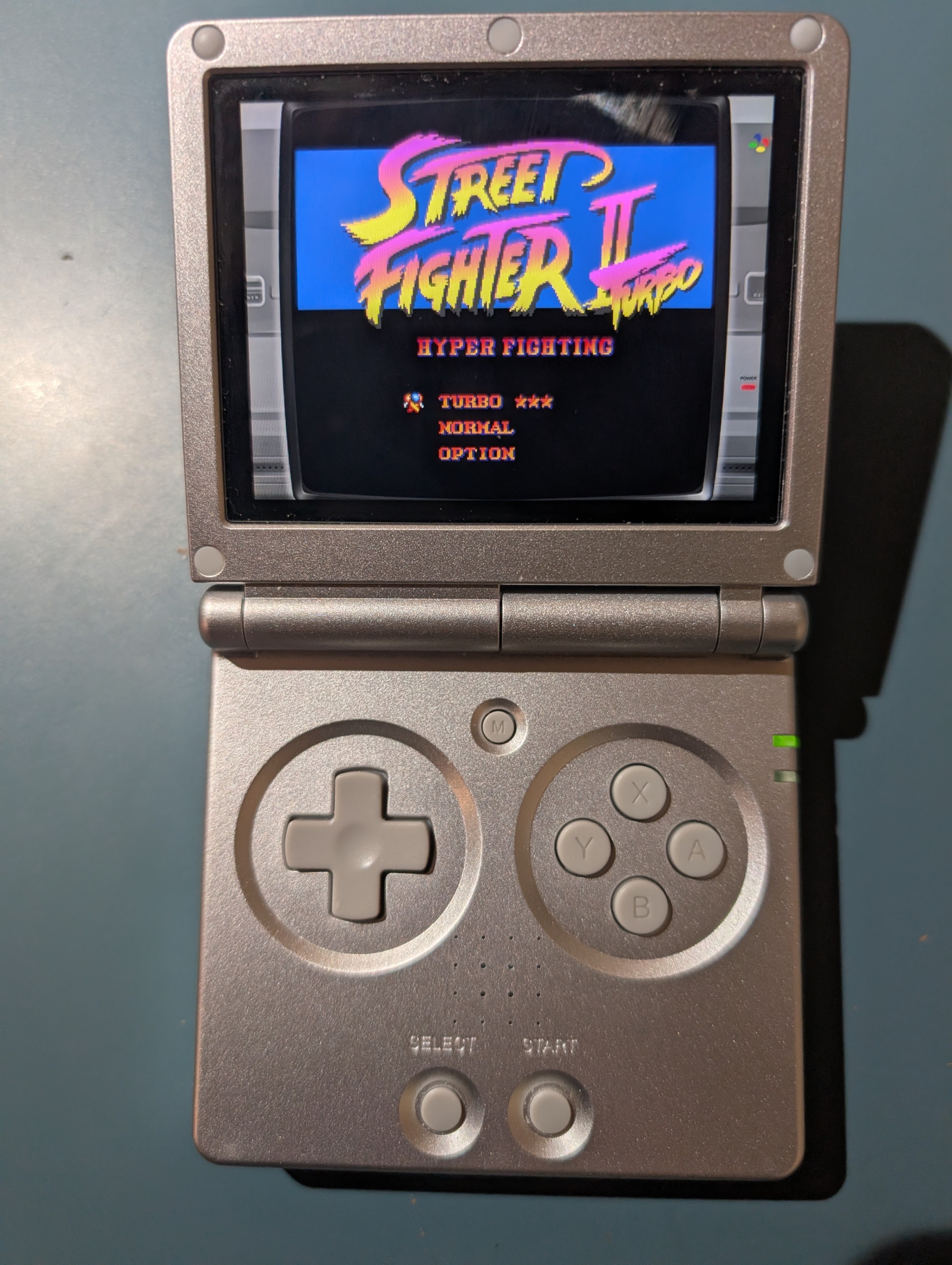Used ANBERNIC RG35XXSP Silver Handheld Game Console with Bonus - photo 4