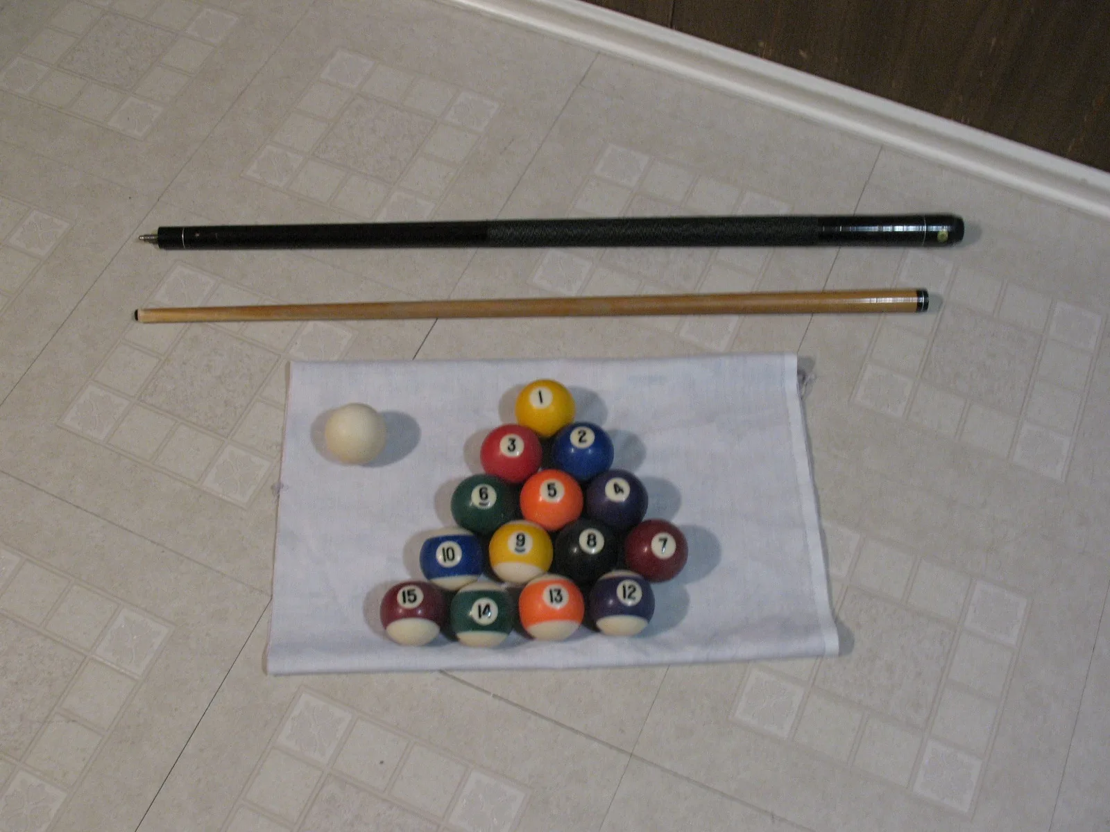 Billiard Balls and Cue
