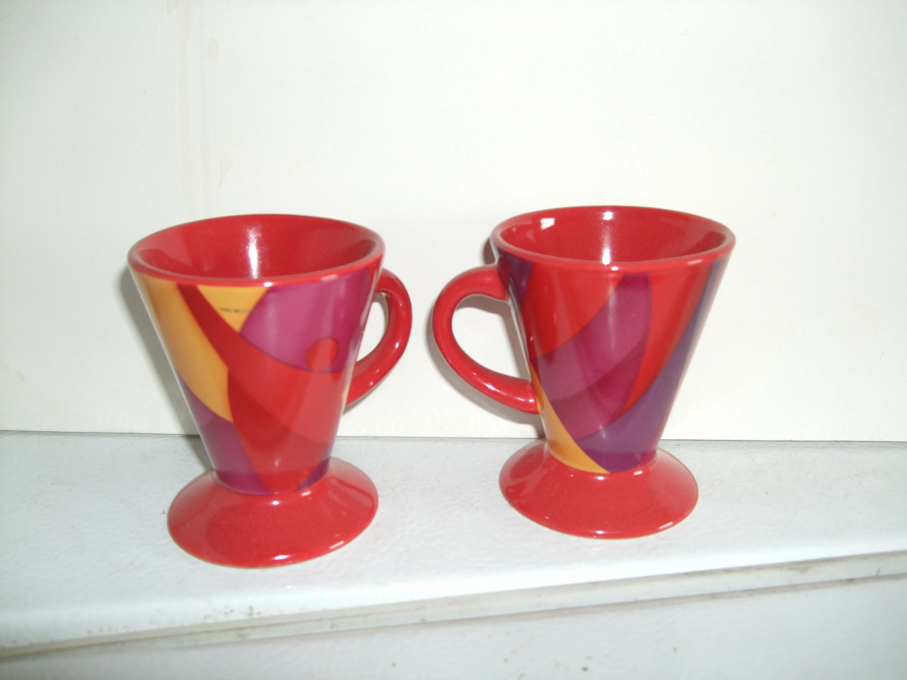 Two Red Decorative Mugs