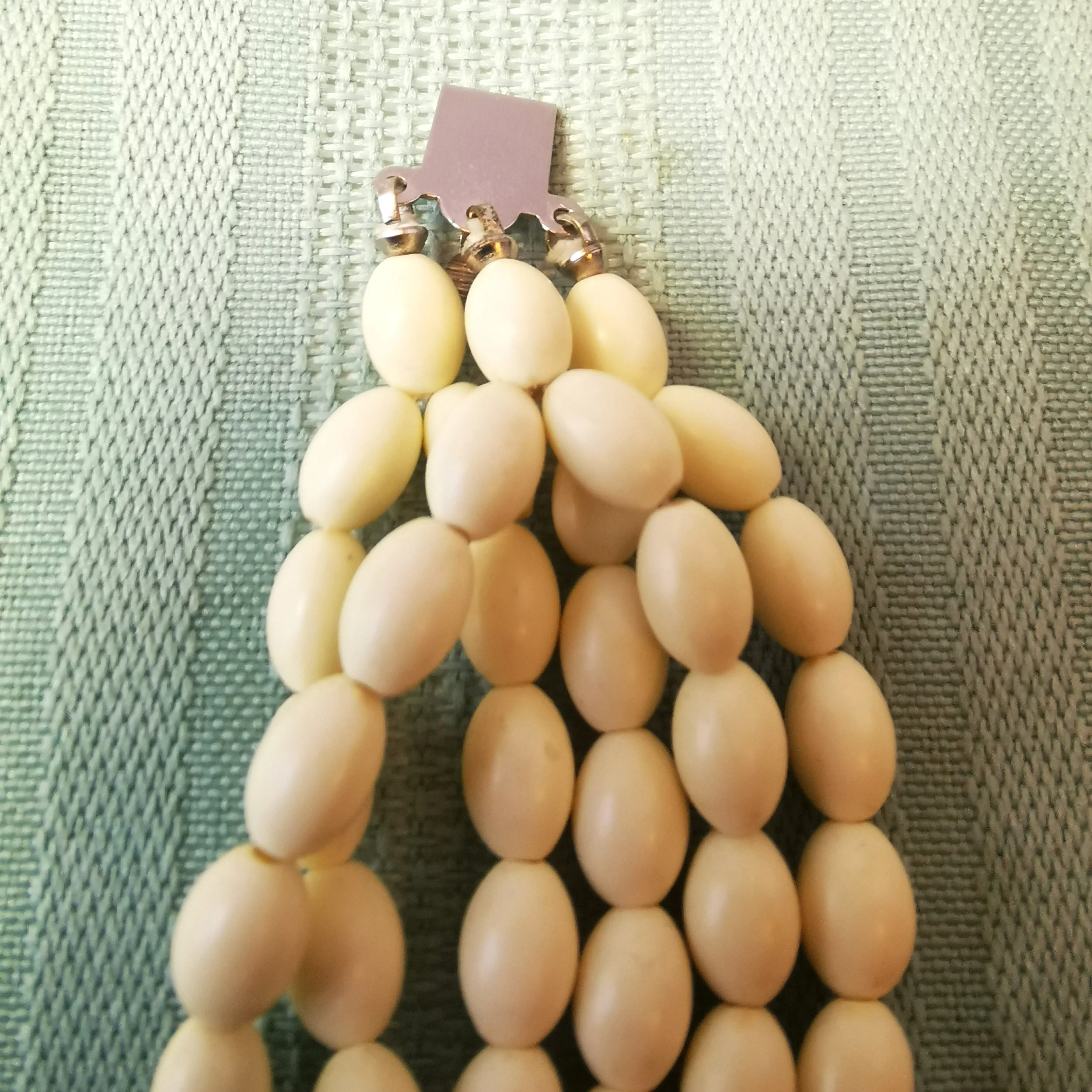 Multi-Strand White Bead Bracelet with Ornate Silver-Tone Clasp image indicator(7)