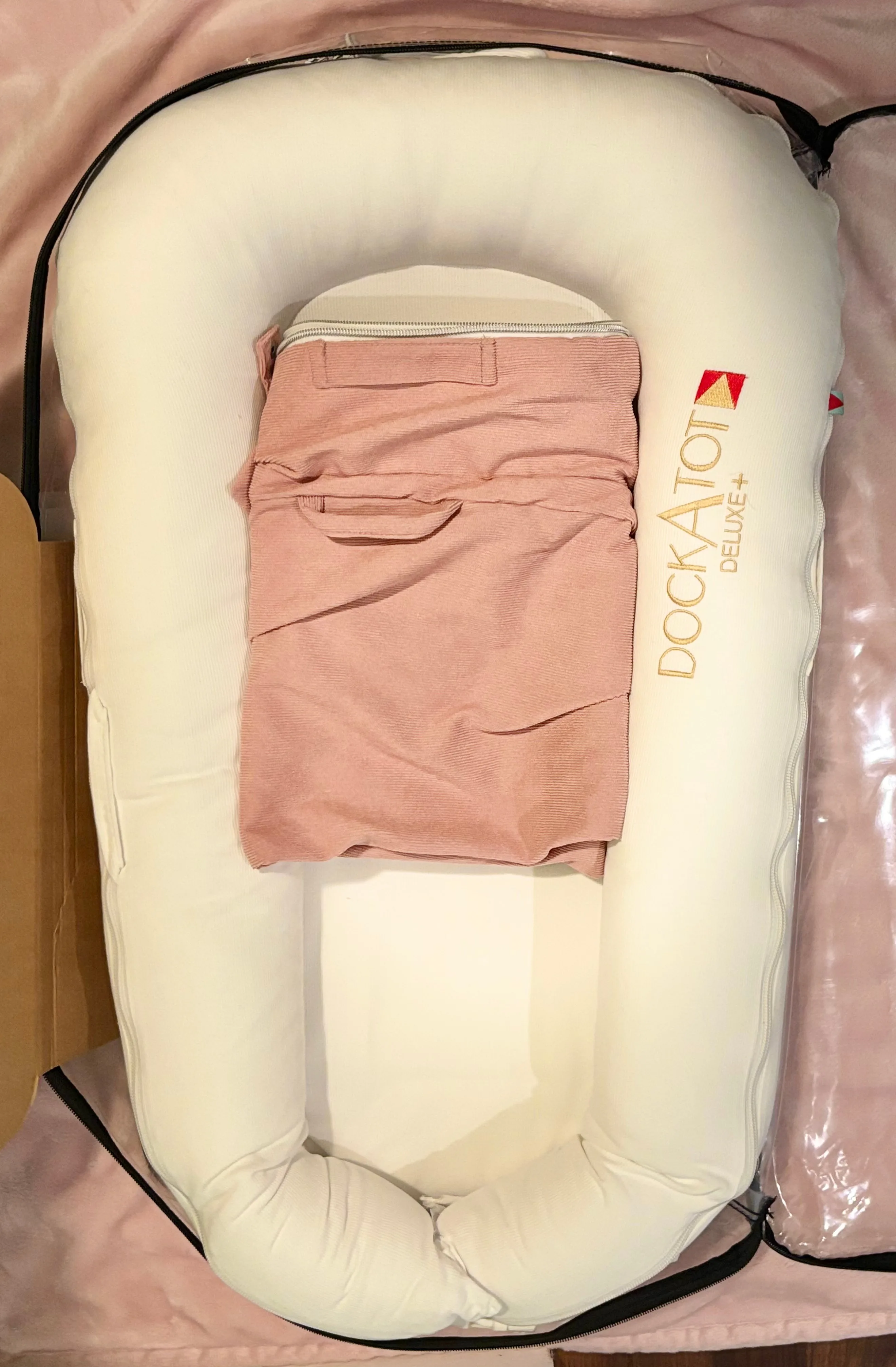 White Deluxe+ DockATot w Pink Cover  — GREAT condition image indicator(2)