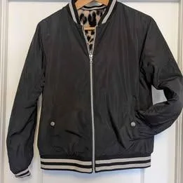 Girl's "Justice" reversible warm jacket - size 14/16