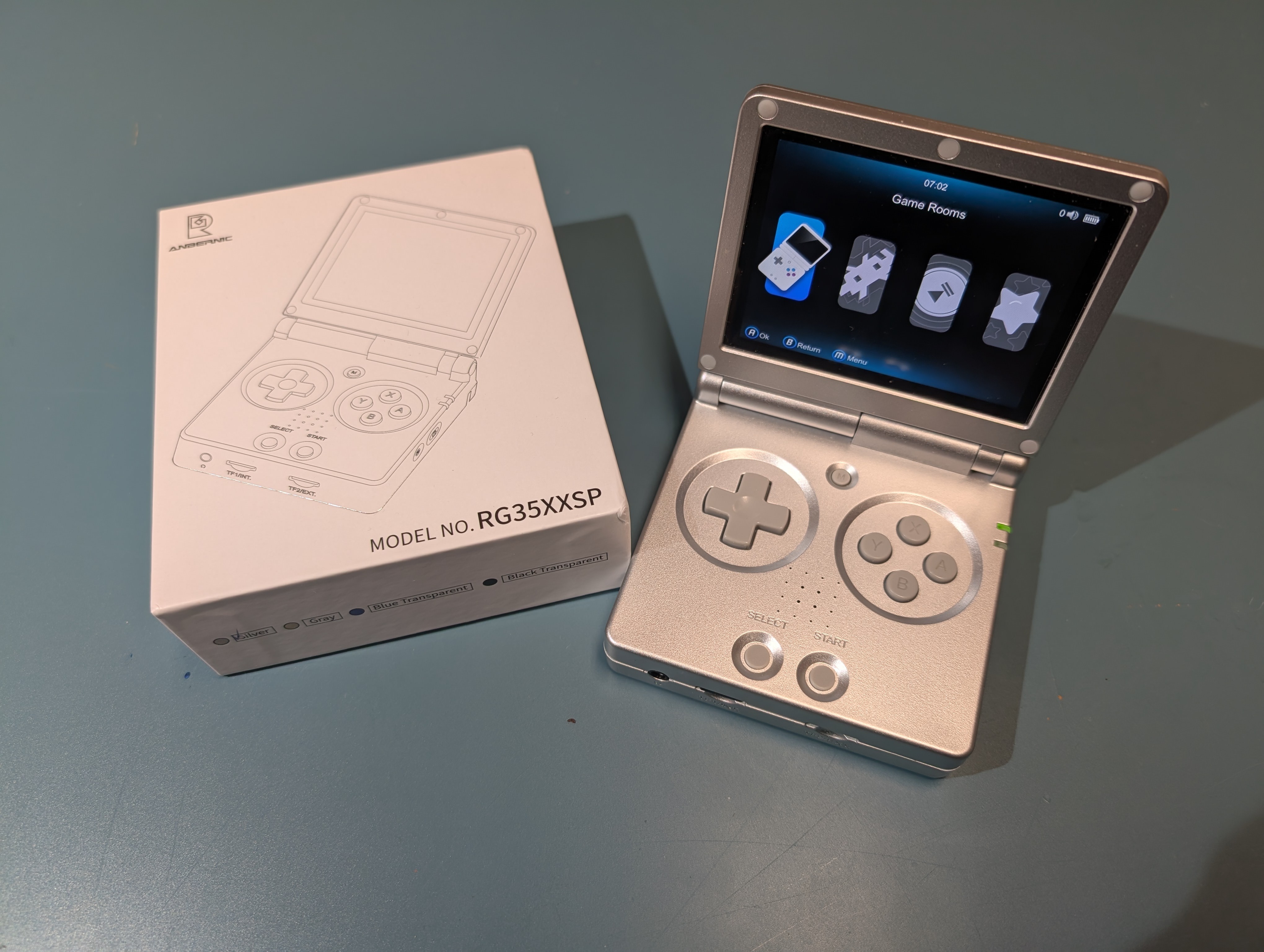 Used ANBERNIC RG35XXSP Silver Handheld Game Console with Bonus