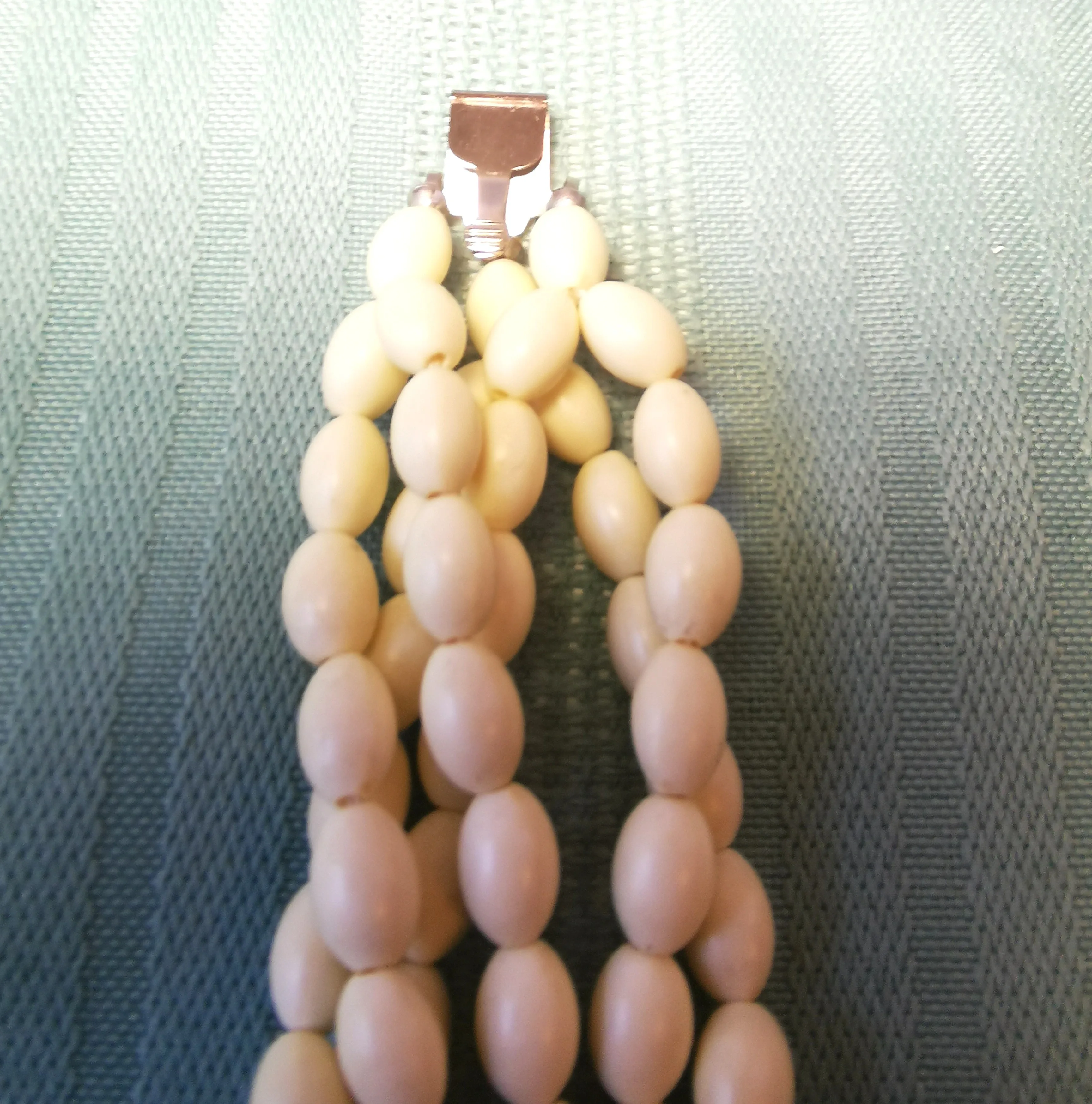 Multi-Strand White Bead Bracelet with Ornate Silver-Tone Clasp image indicator(10)