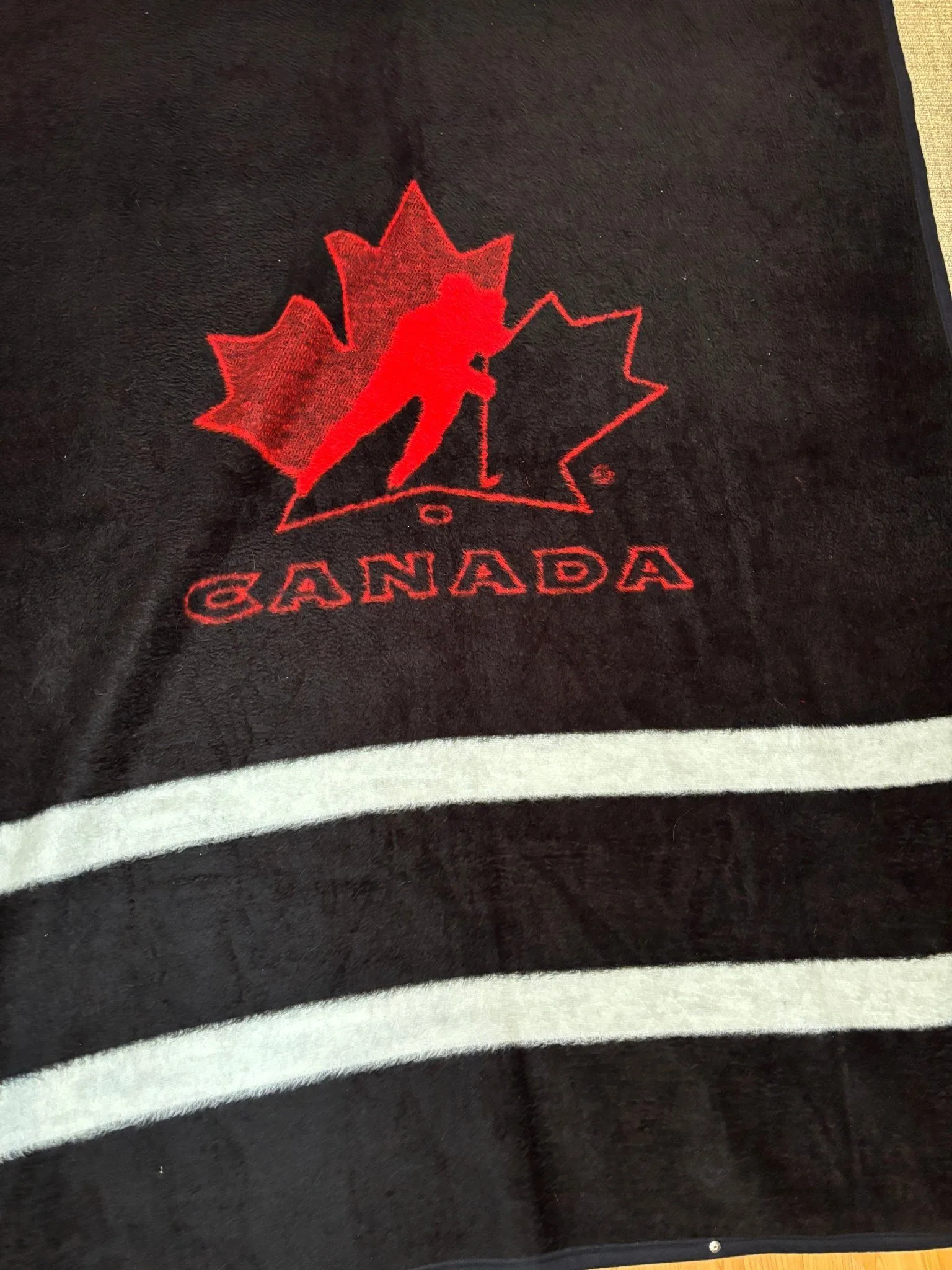 Biederlack Team Canada Hockey Snuggle Wrap Fleece Blanket image indicator(4)