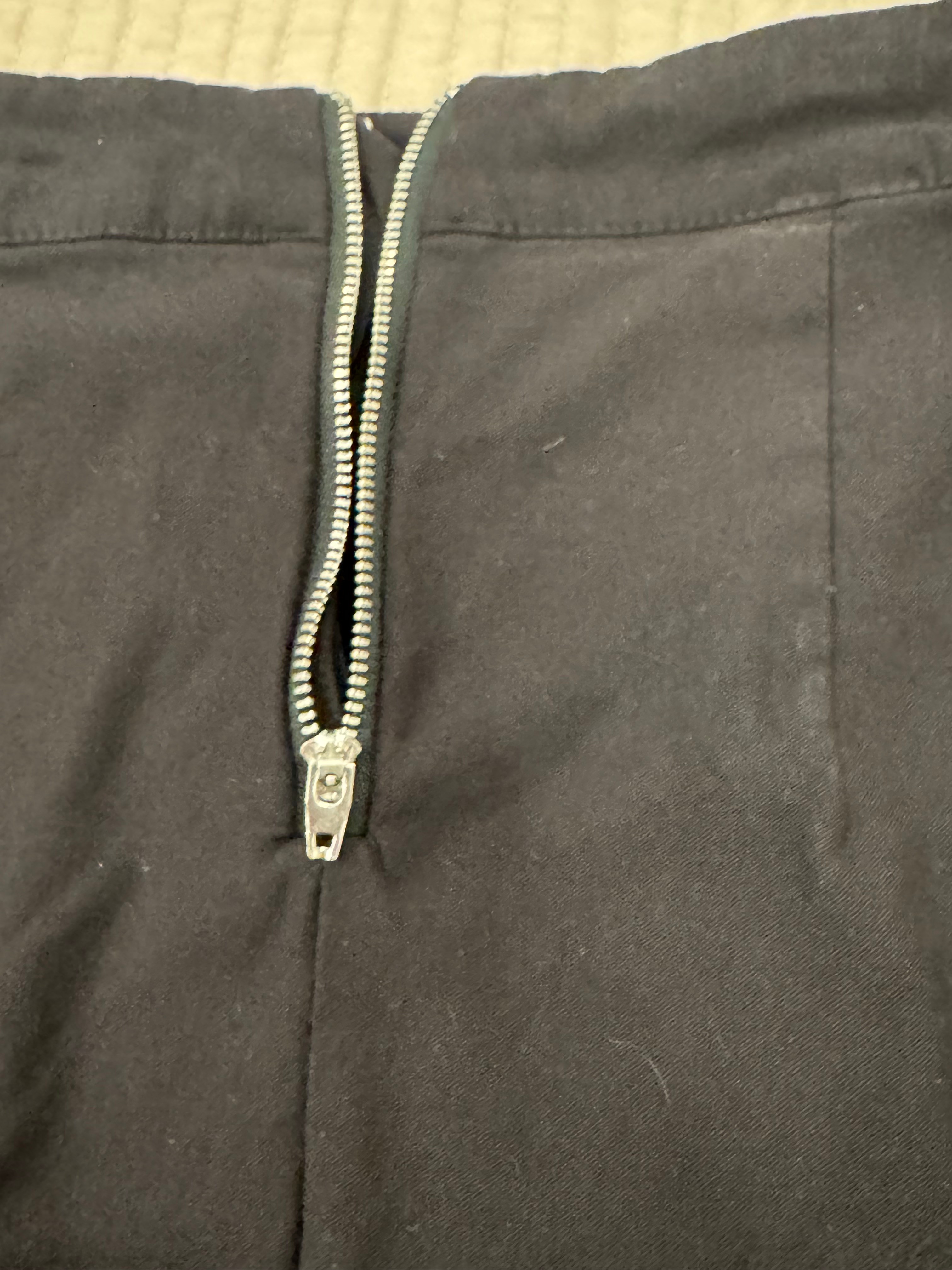 Black mini skirt with back zipper - photo 3