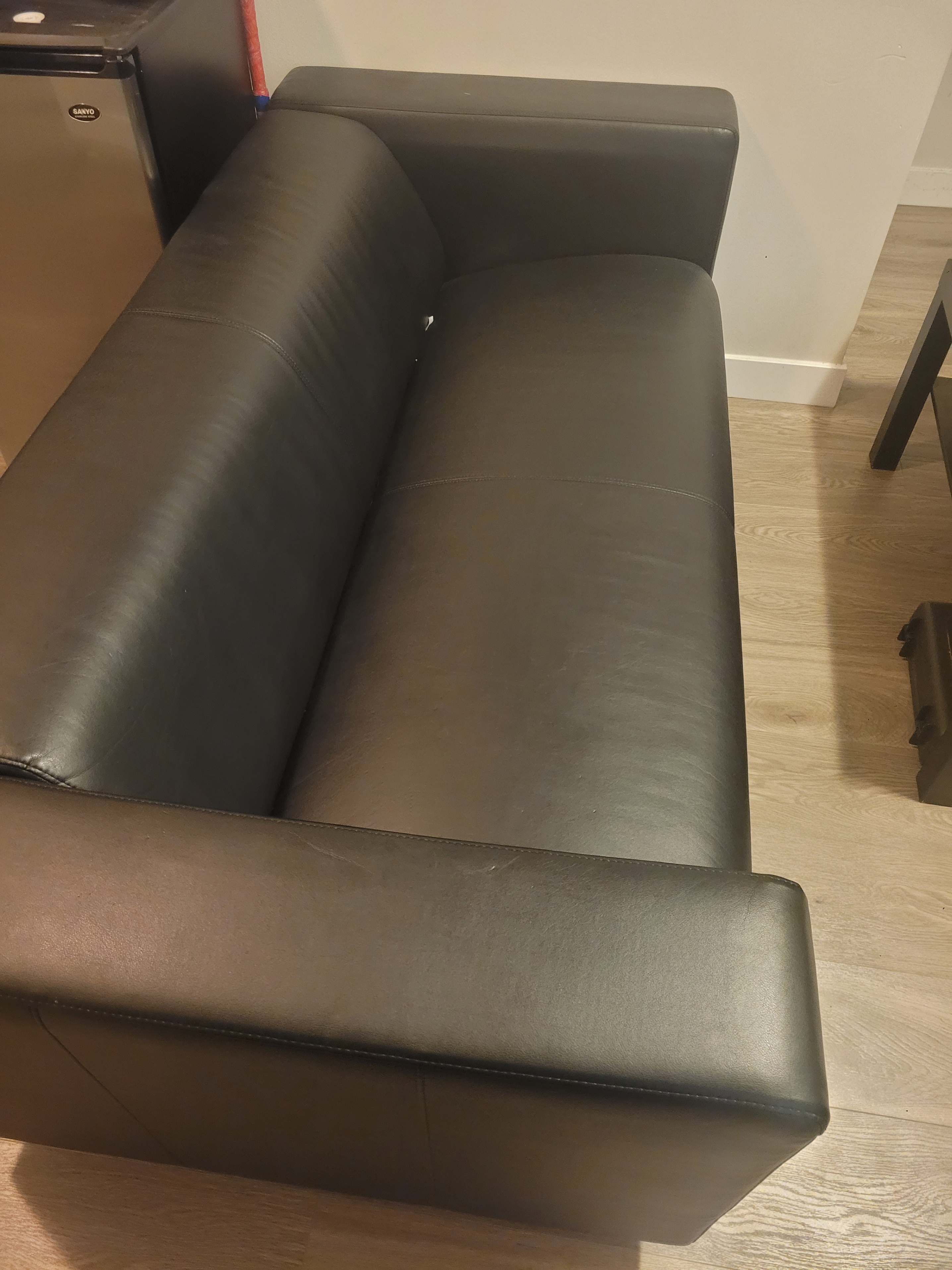Black 2-Seater Faux Leather Sofa – Good Condition - photo 3