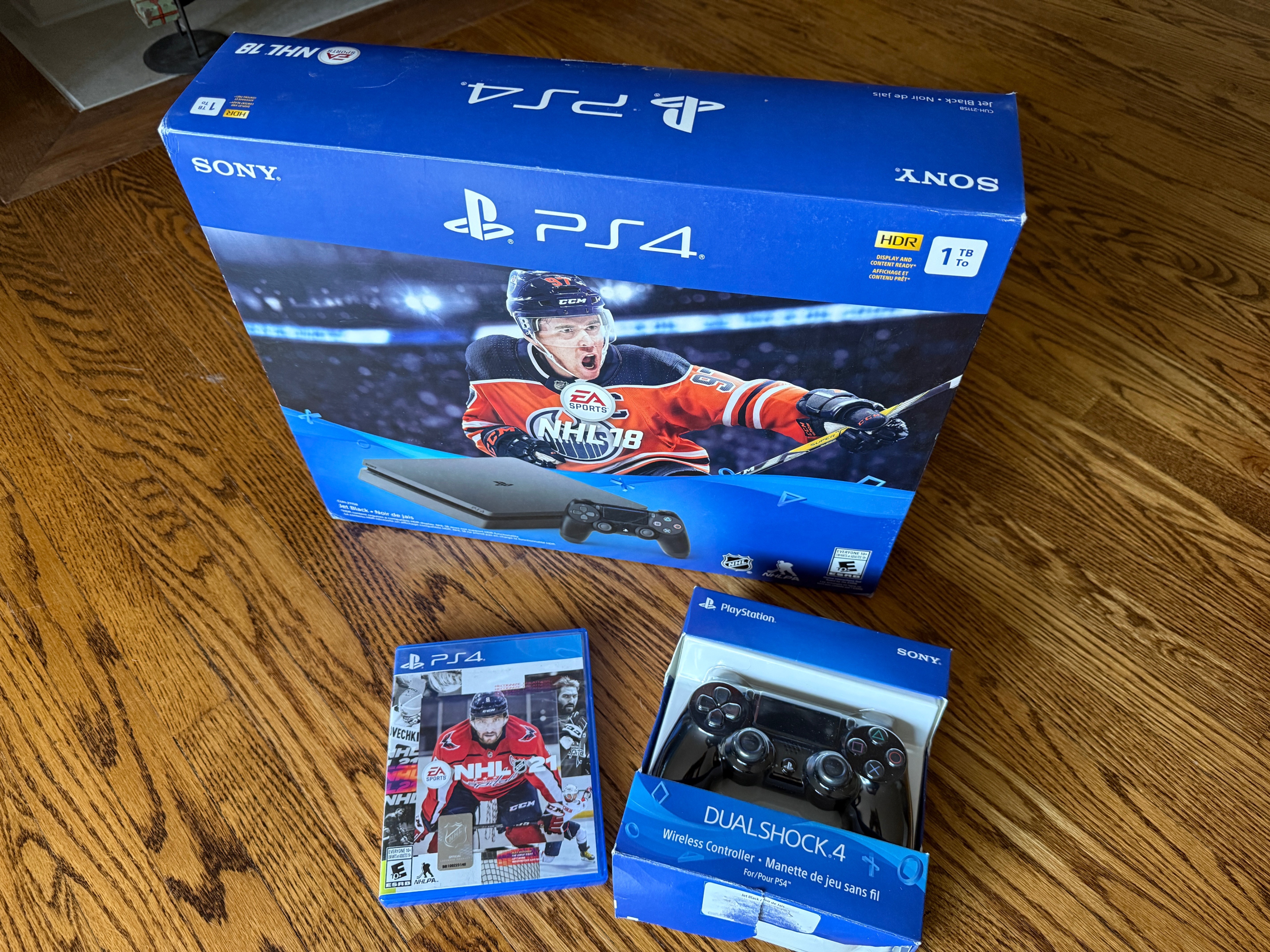 Sony PlayStation 4 (PS4) 1TB NHL 18 Bundle + Extras