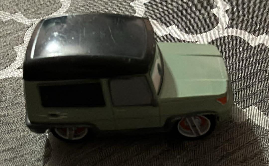 Disney Cars 2 Miles Axelrod Metal Diecast Car - 3 Inches - photo 2