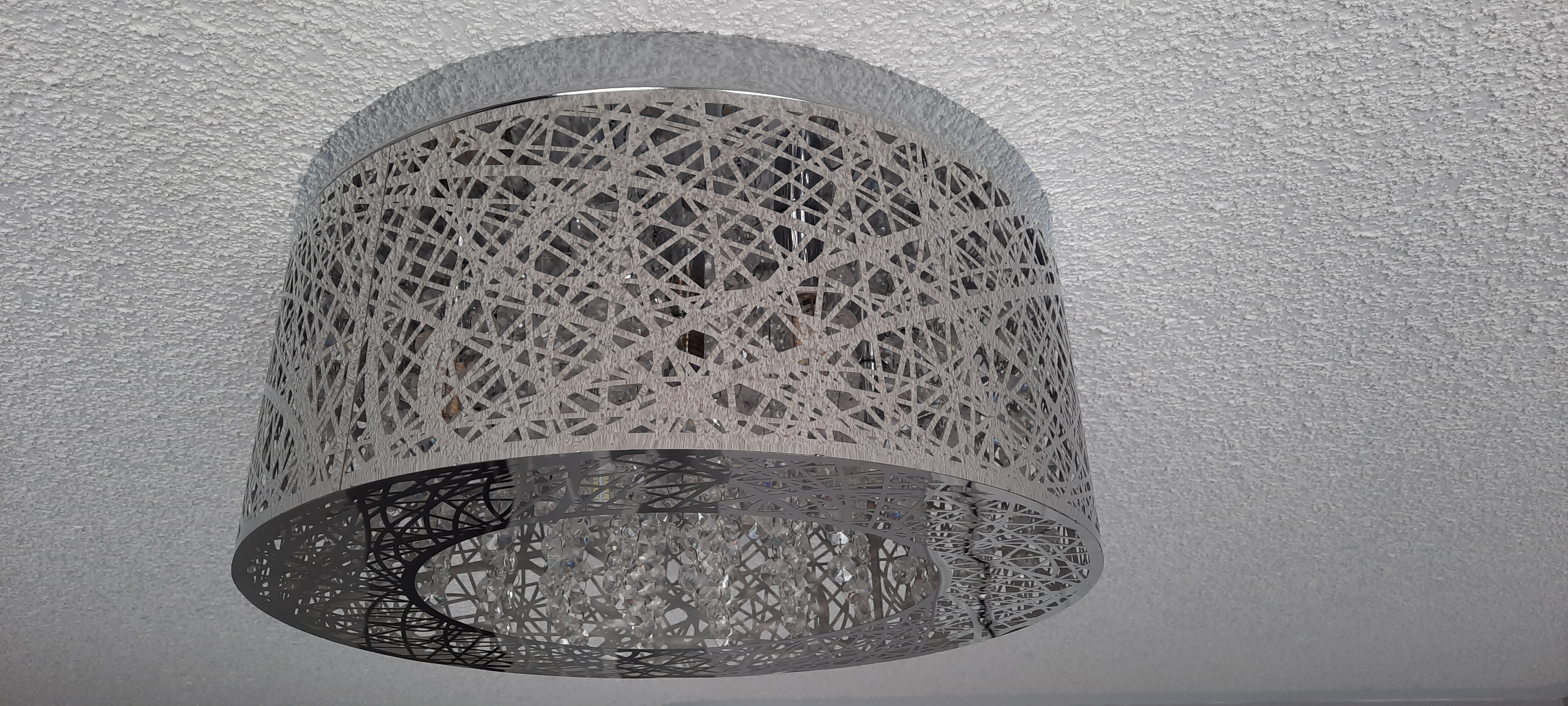 5 Light Stainless Steel Chandelier with Laser Cut Mirror.