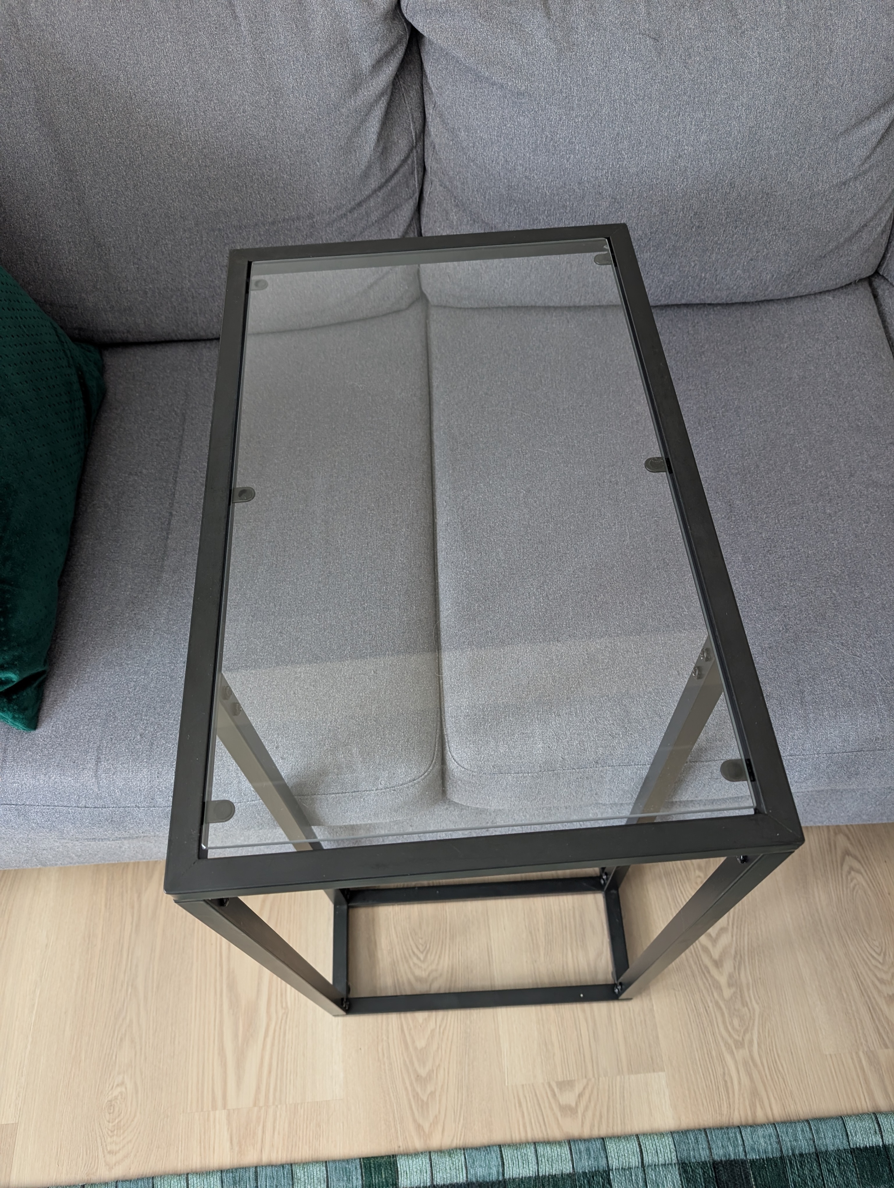 IKEA VITTSJÖ Glass Top Stand/Table with a Black Frame