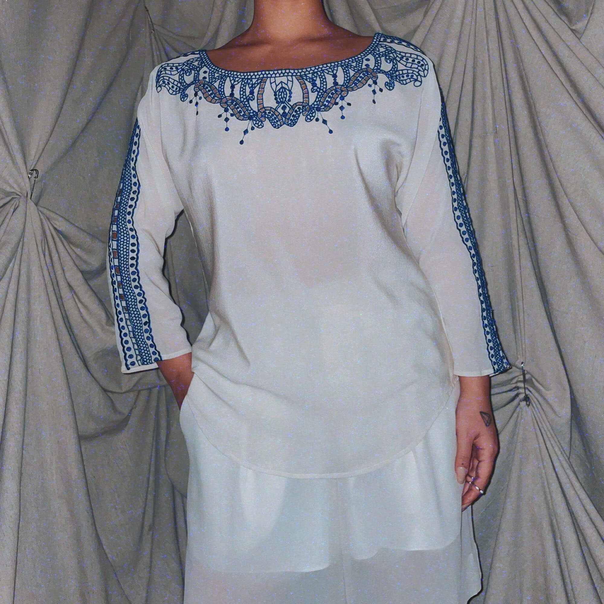 white silk shirt w blue embroidered embellishments