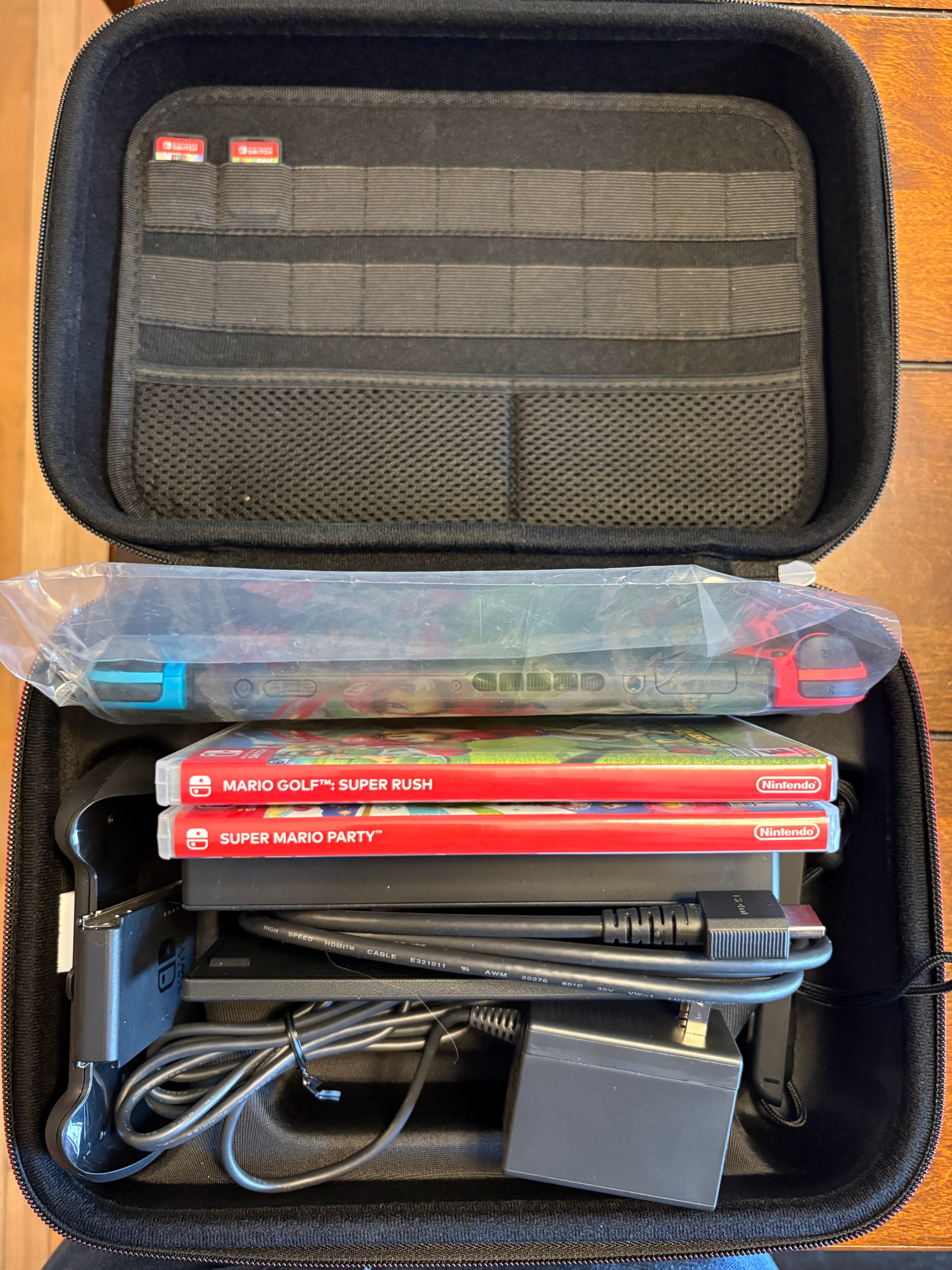 Nintendo Switch (v2) Neon + Case + 2 Games — Great Bundle! - photo 2