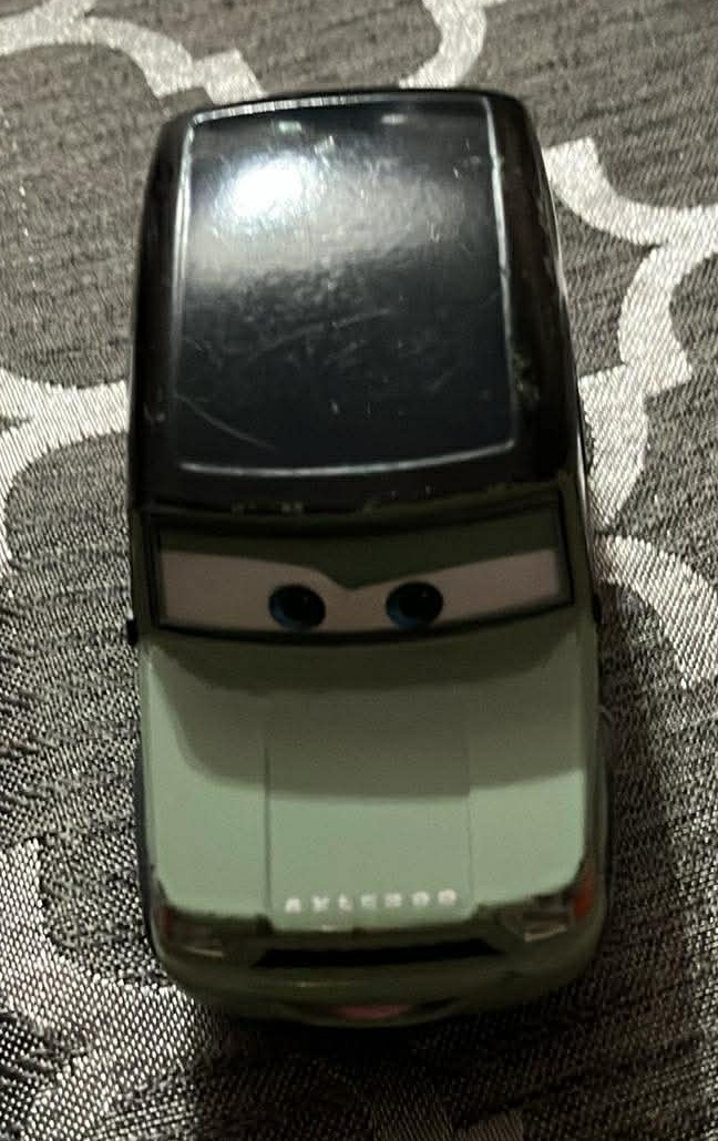Disney Cars 2 Miles Axelrod Metal Diecast Car - 3 Inches