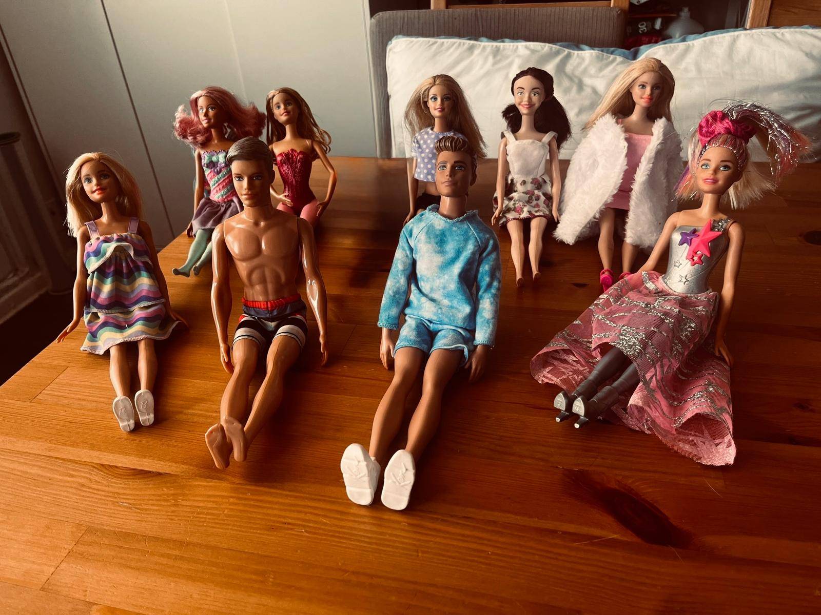 7 Barbies and 2 Kens