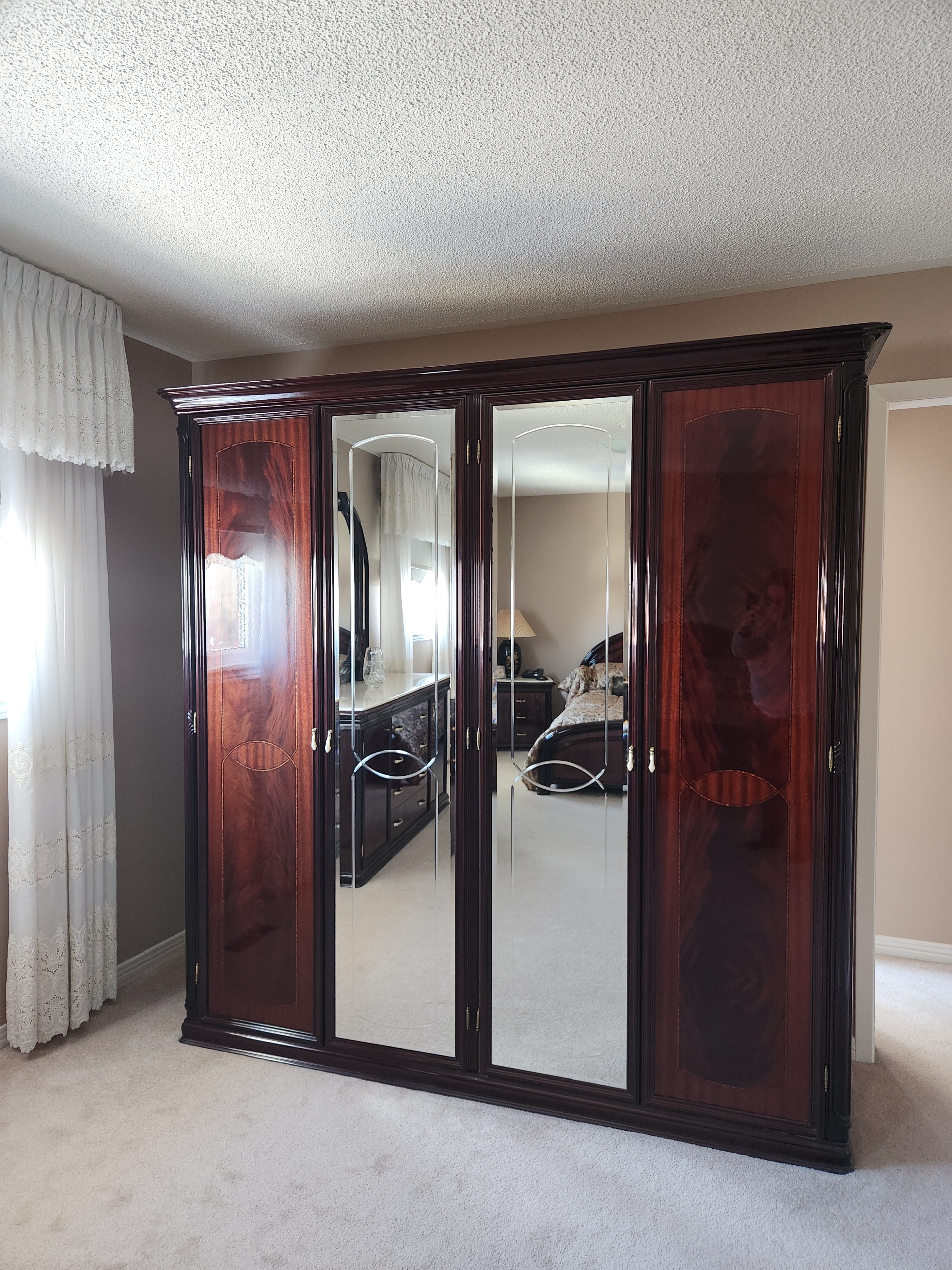 Large Wooden Armoire with Mirrored Doors