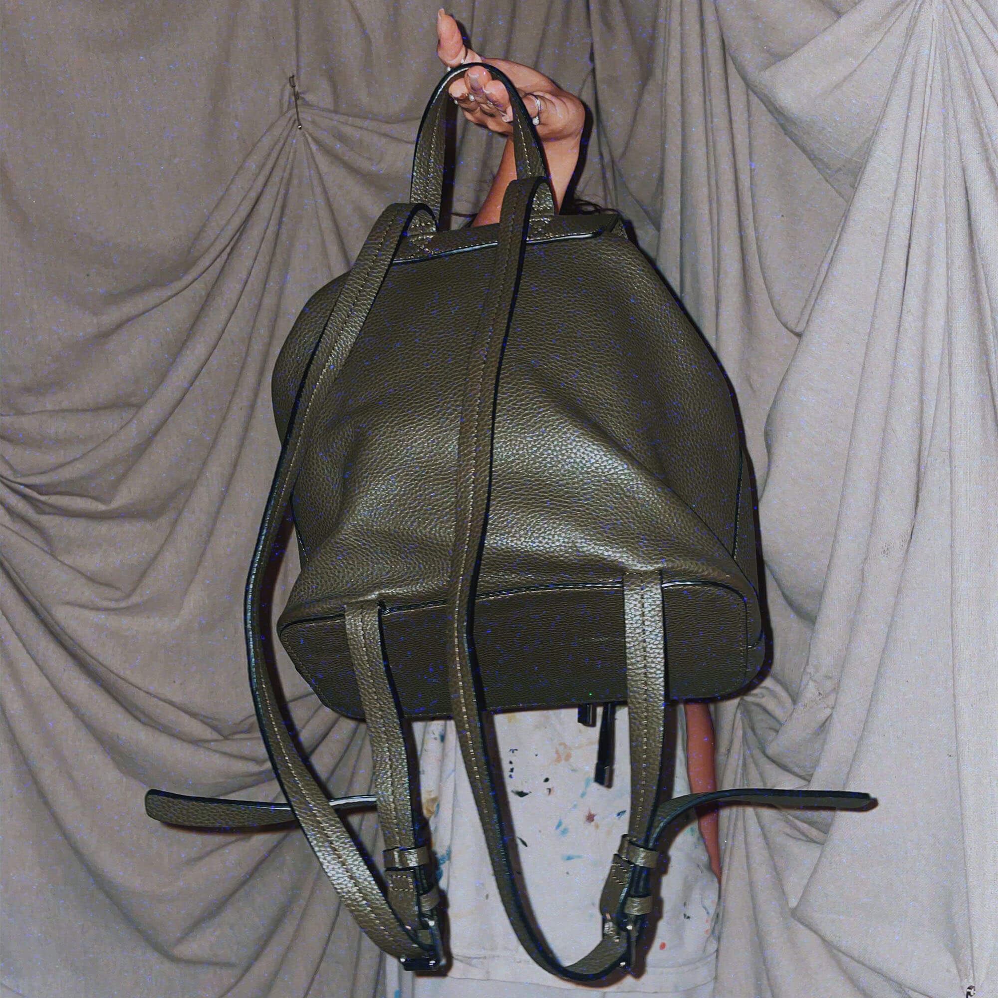 small olive green leather backpack