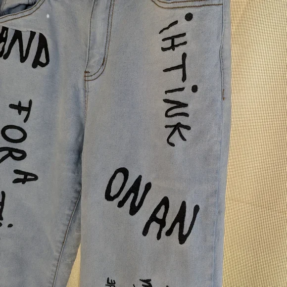 Distressed Jeans with Graffiti Design - photo 5