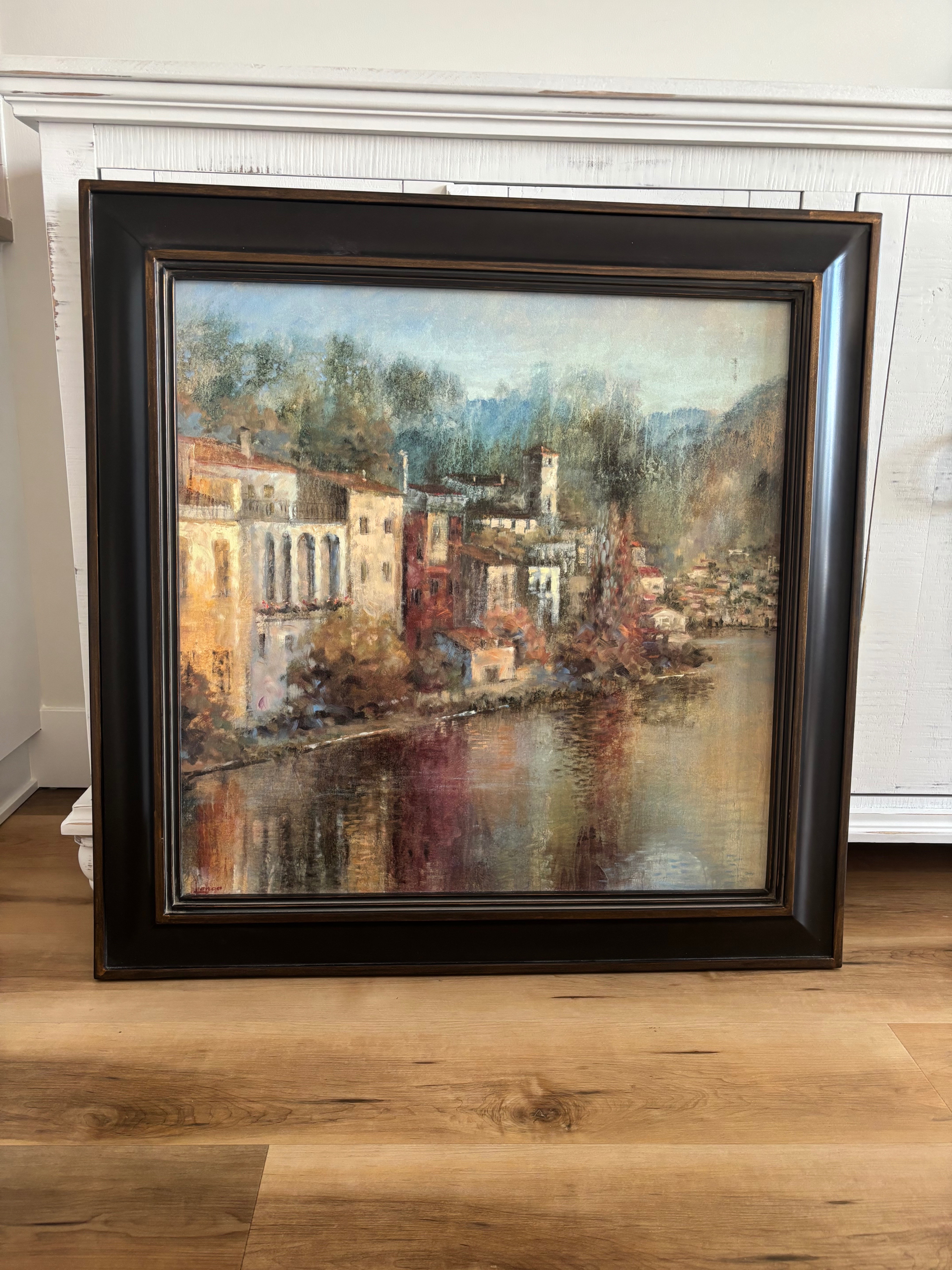 large painting with wooden frame
