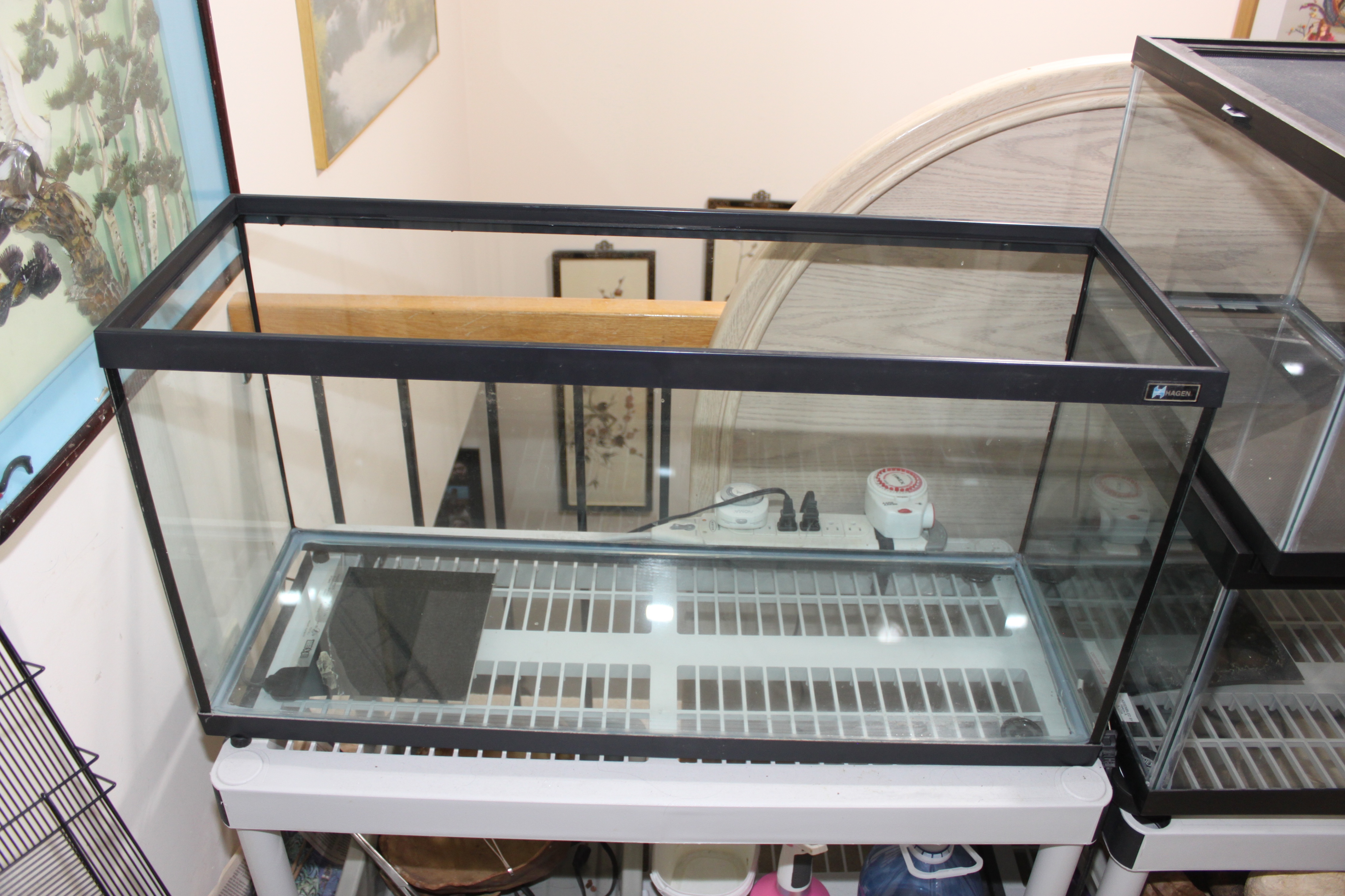Hagan glass enclosure with metal grill