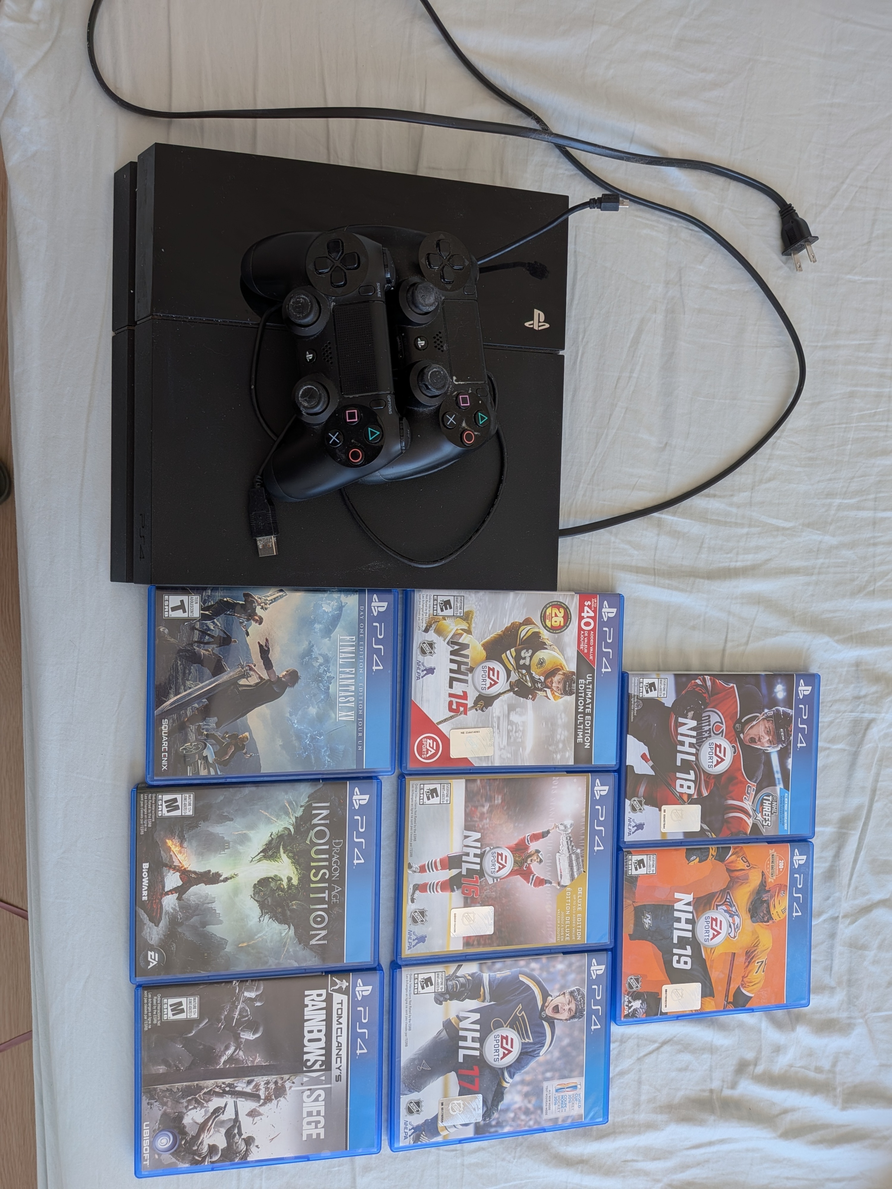 PS4 Bundle – 2 Controllers, 8 Games (FF15, R6 Siege, and more)