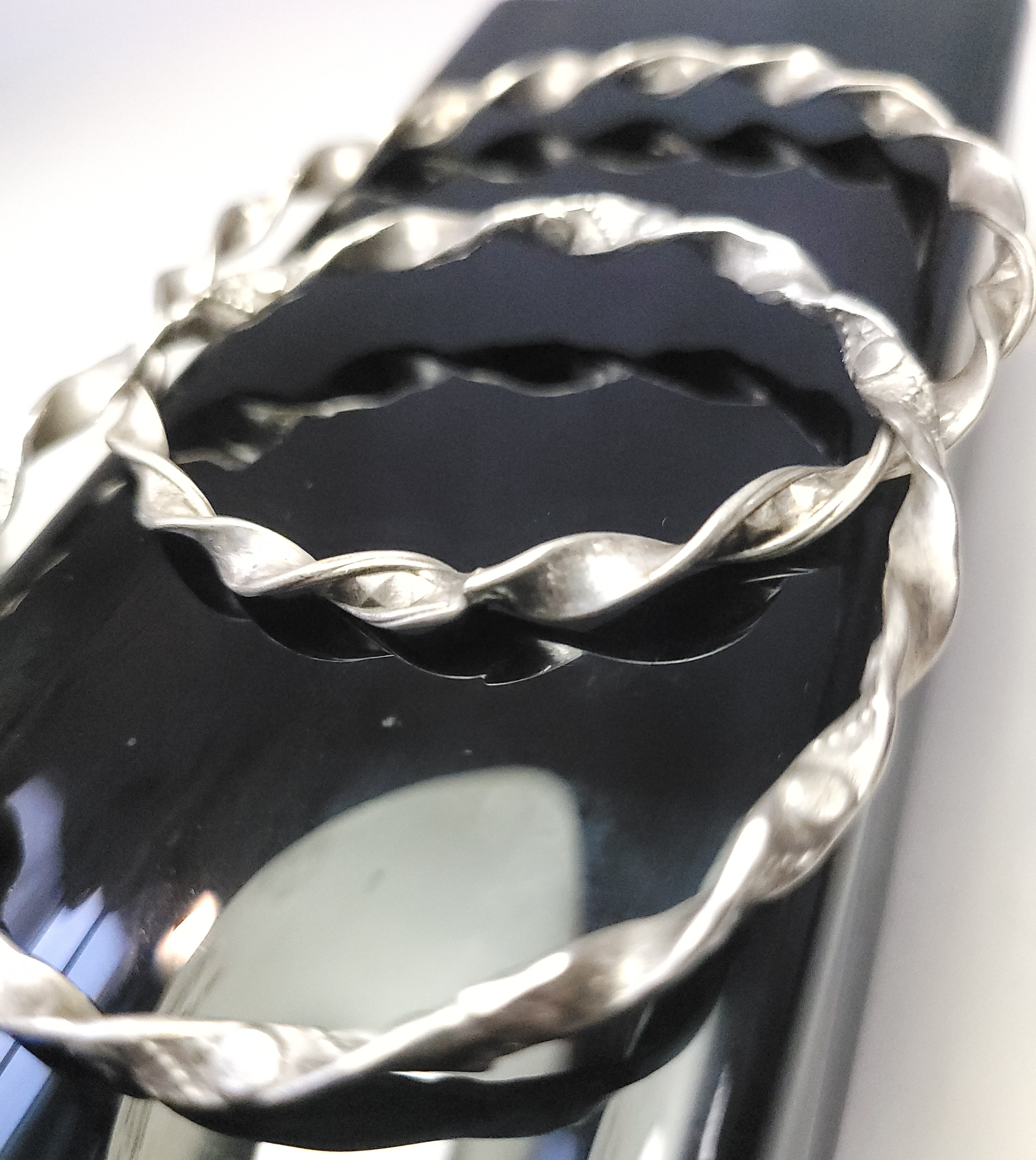 Pair of Silver Tone Twisted Ribbon Bangle Bracelets - 7.5cm - photo 2