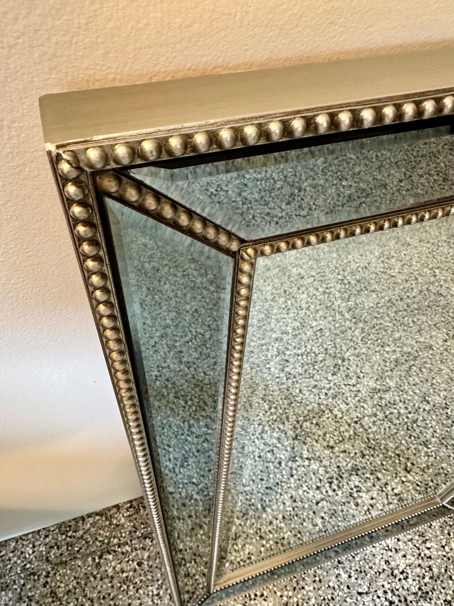 Antique finsh. Ornate silver framed Mirror