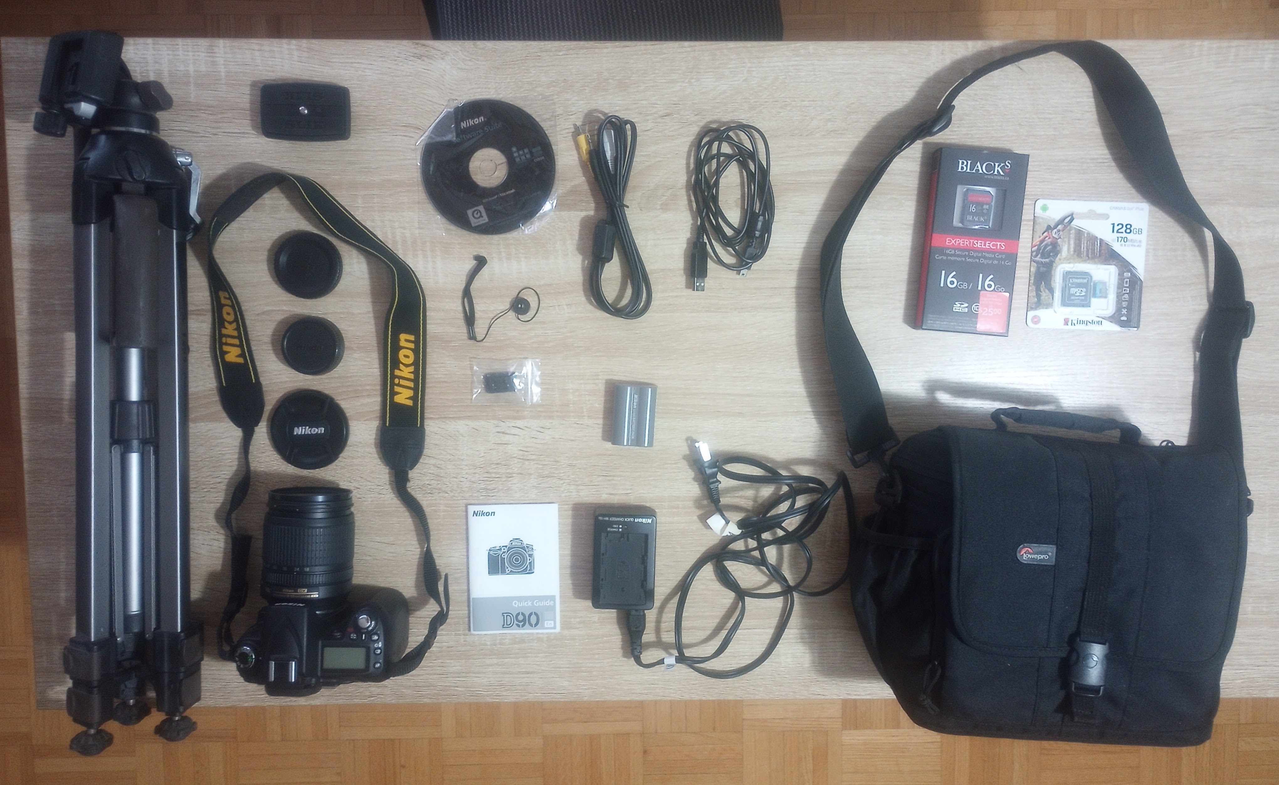Nikon D90 DSLR Camera, Carry Bag, Tripod, SD Card, and more