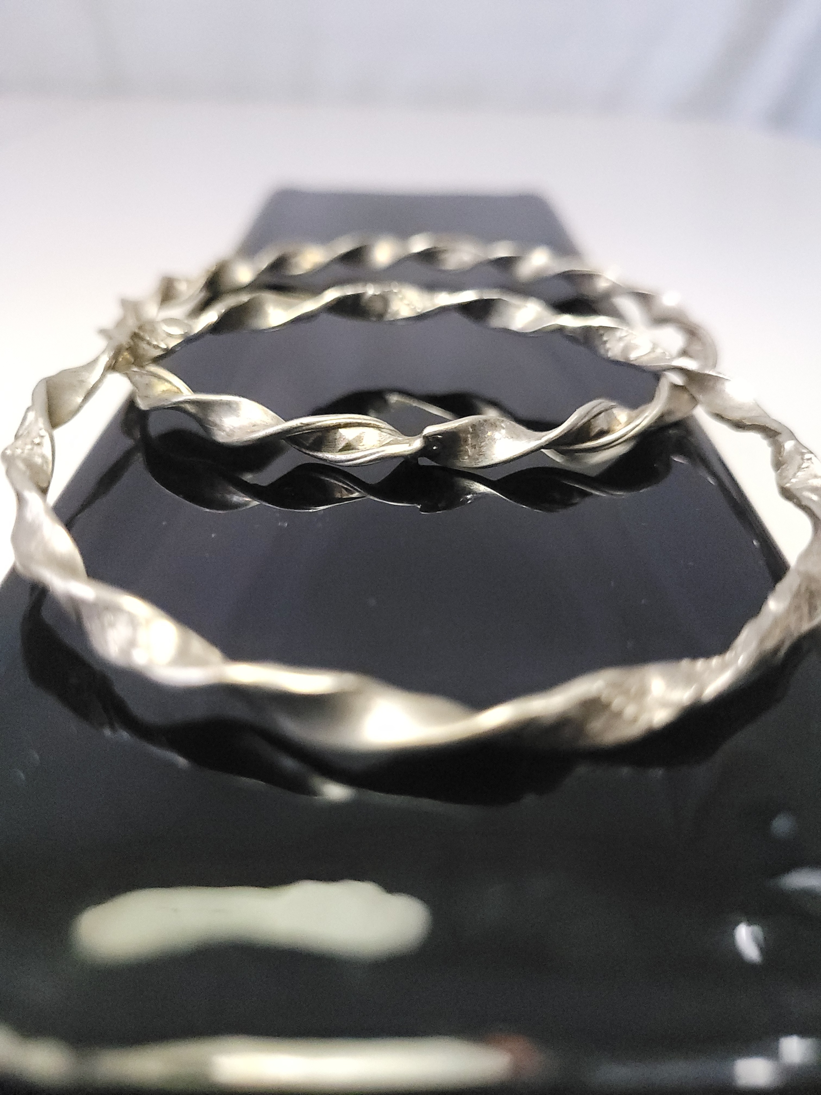 Pair of Silver Tone Twisted Ribbon Bangle Bracelets - 7.5cm