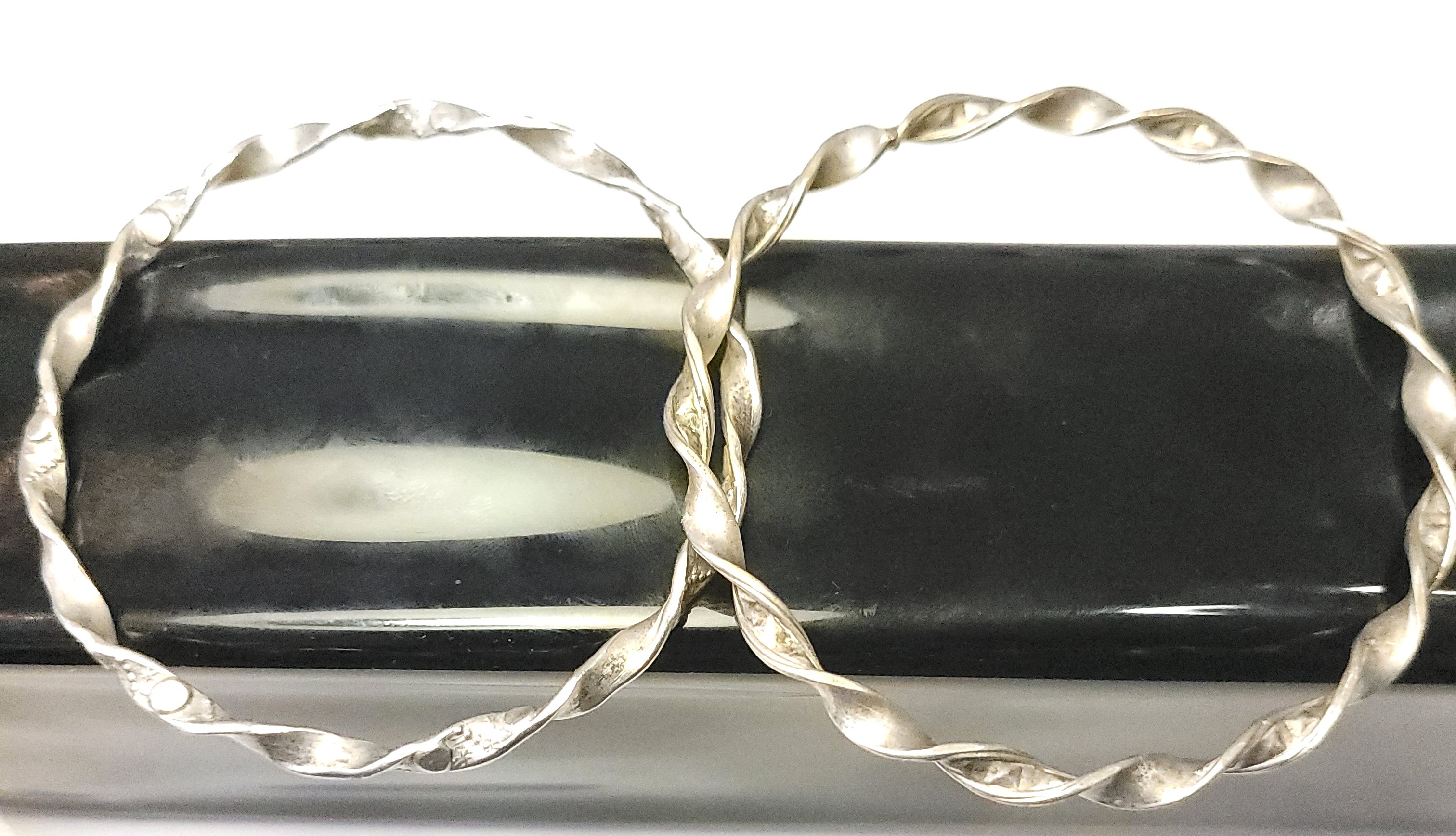 Pair of Silver Tone Twisted Ribbon Bangle Bracelets - 7.5cm - photo 4