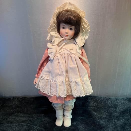 Title: Vintage Porcelain Doll Brown Hair Collectible